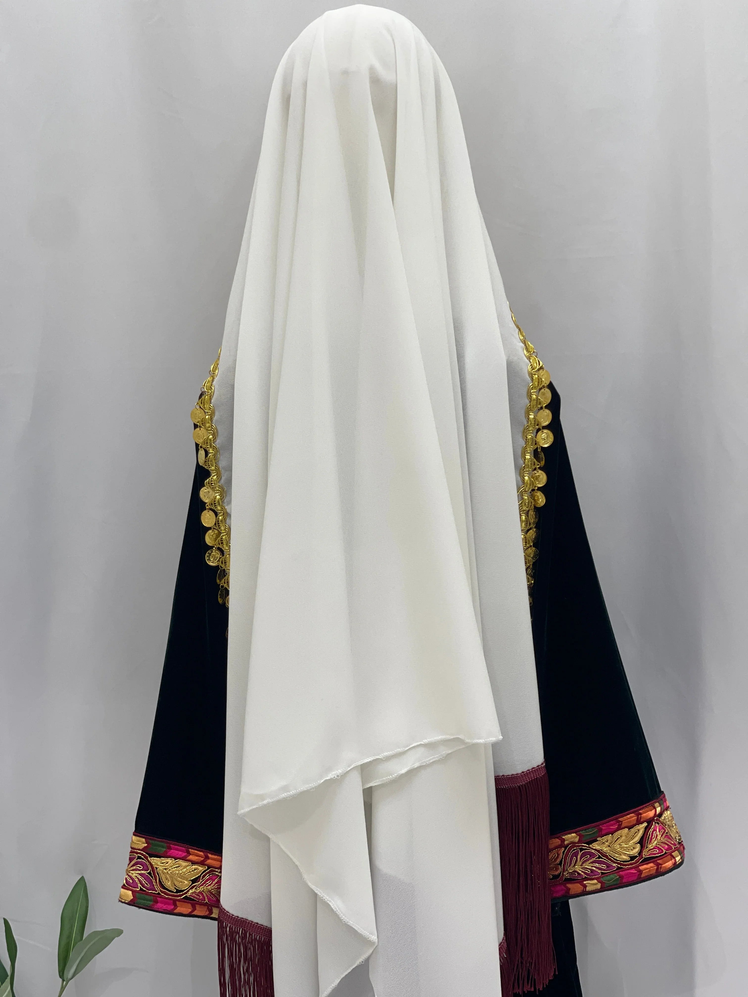 Emerald Velvet Embroidered Qasab Thobe with intricate embroidery and flowing design for elegant wear