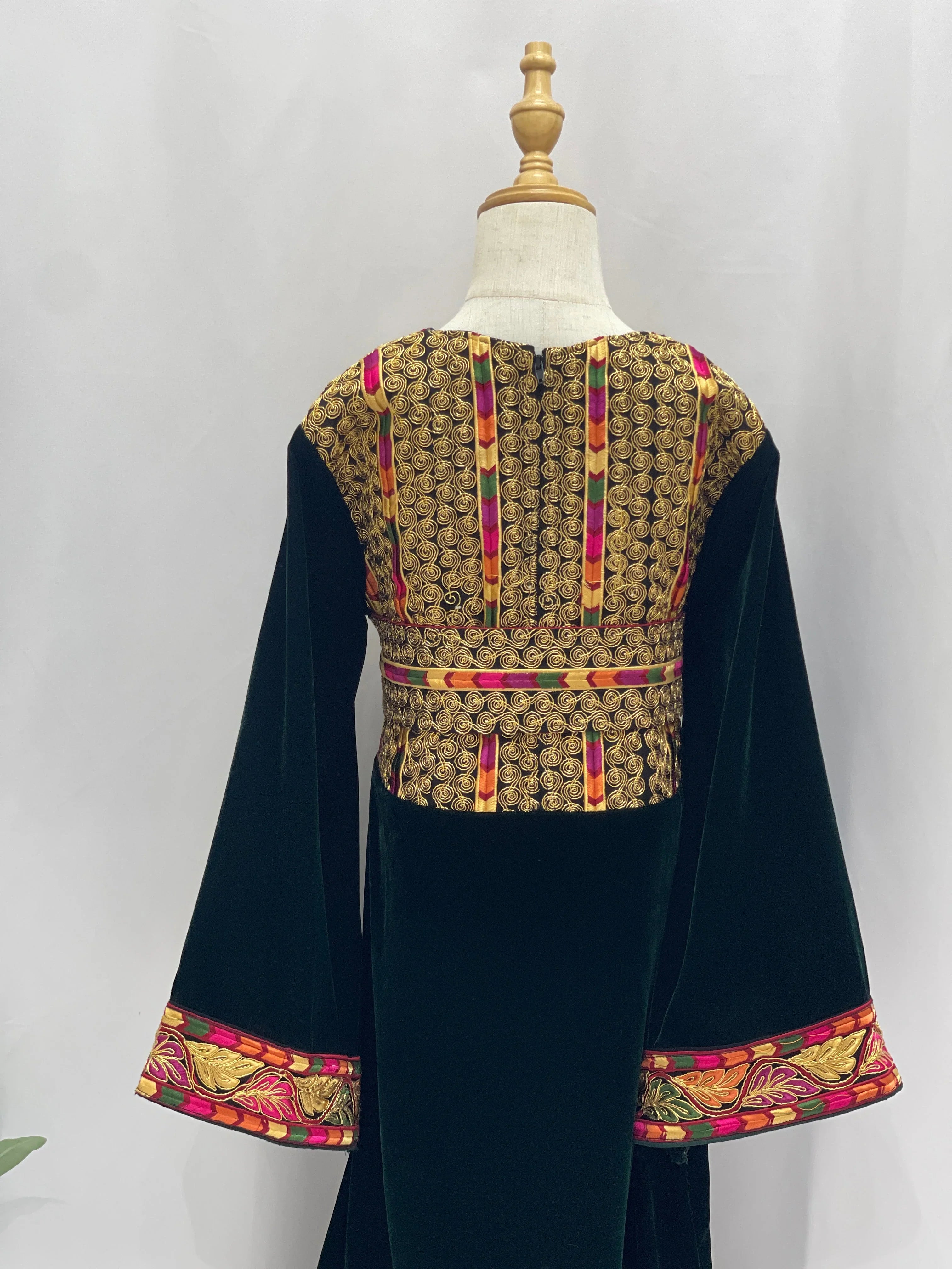 Emerald Velvet Embroidered Qasab Thobe featuring intricate back embroidery and vibrant sleeve details