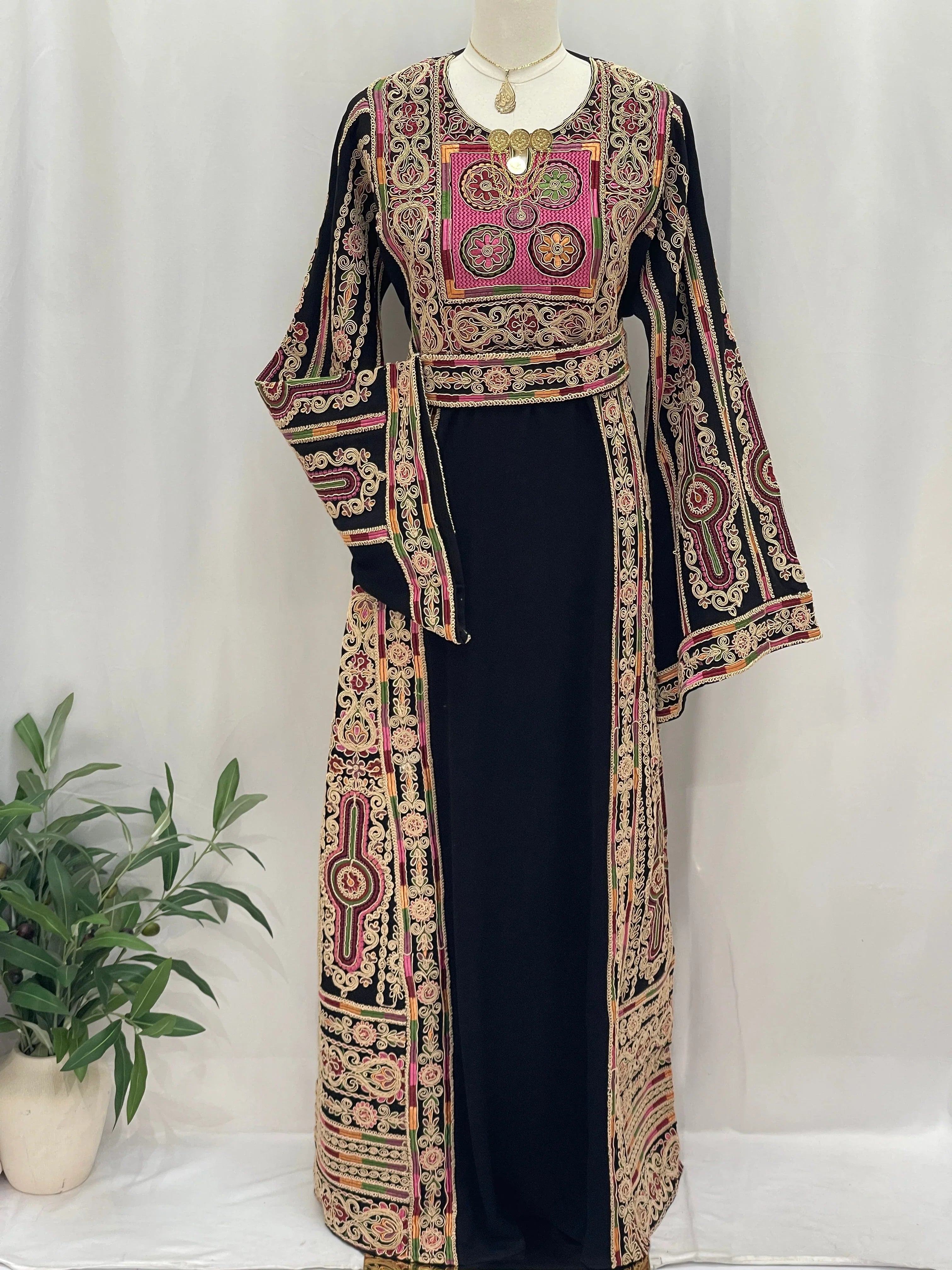 Golden Thread Embroidered Thobe by Palestinian Elegance black traditional dress with intricate gold and pink embroidery