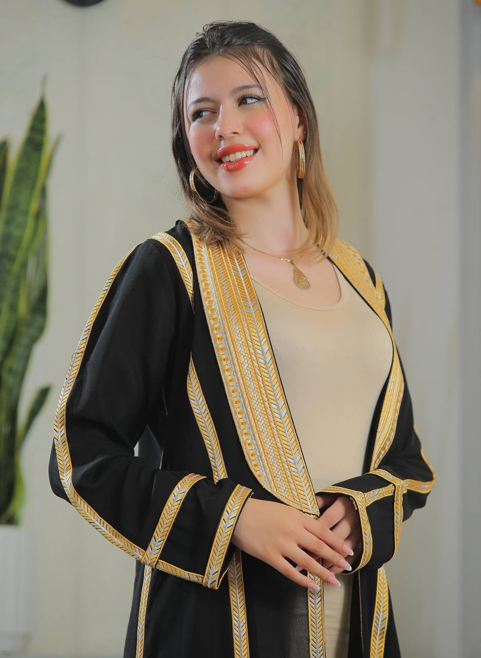 Palestinian Elegance Golden Touch Open Abaya black cardigan with gold embroidered trim on model
