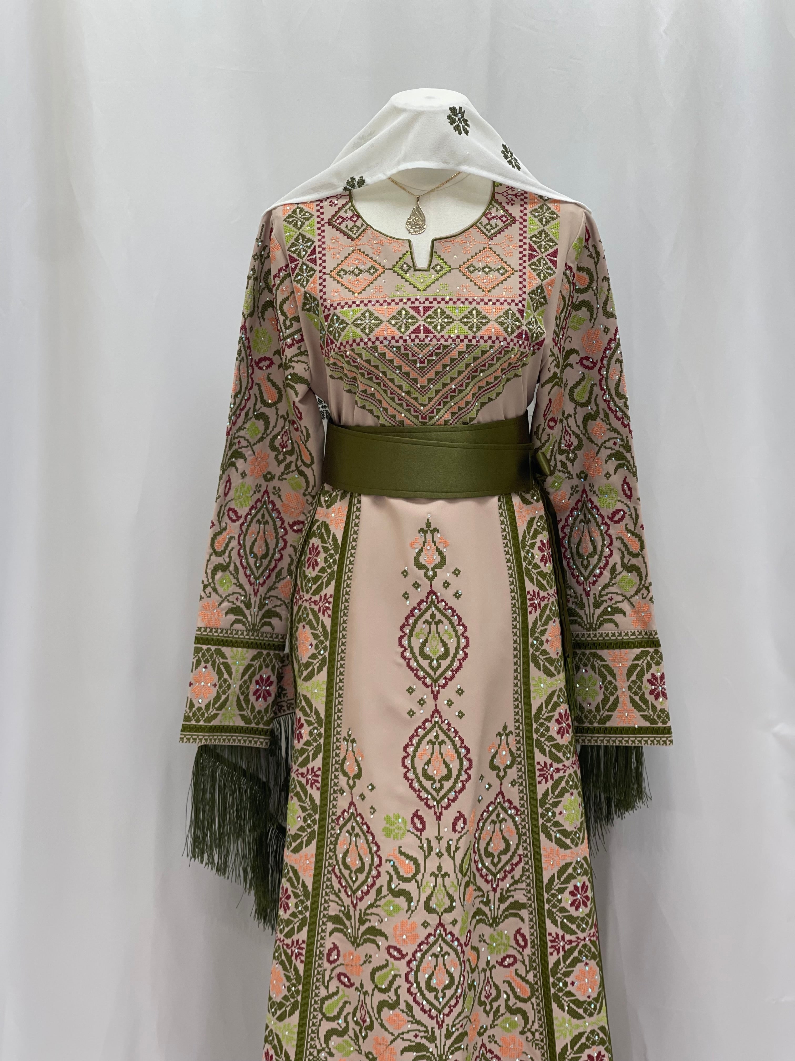 Elegant Green Ruby Embroidered Thobe with intricate patterns and stylish fringe details