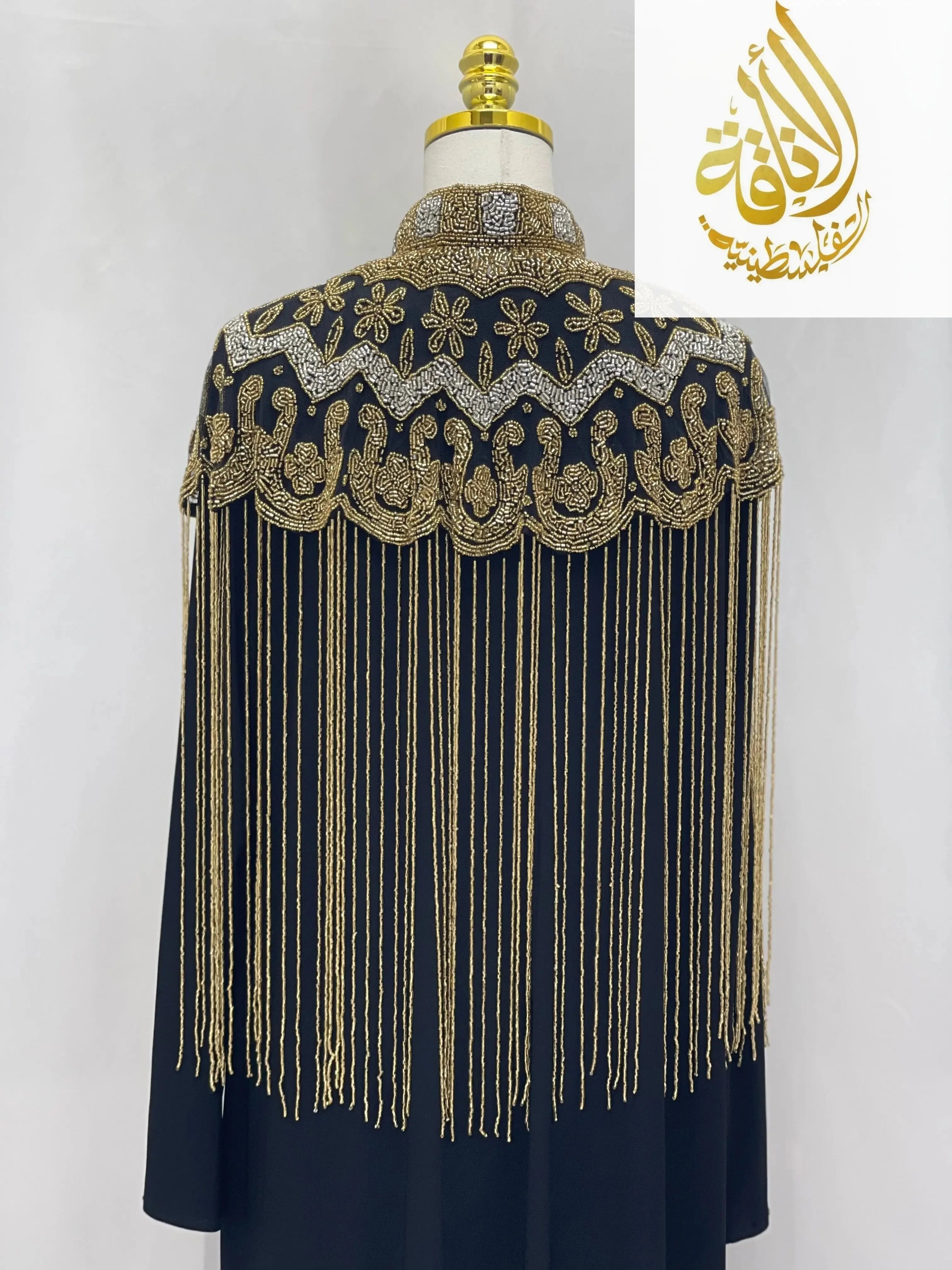 Palestinian Elegance handmade beaded cape cardigan with intricate gold and silver beadwork and long fringe details