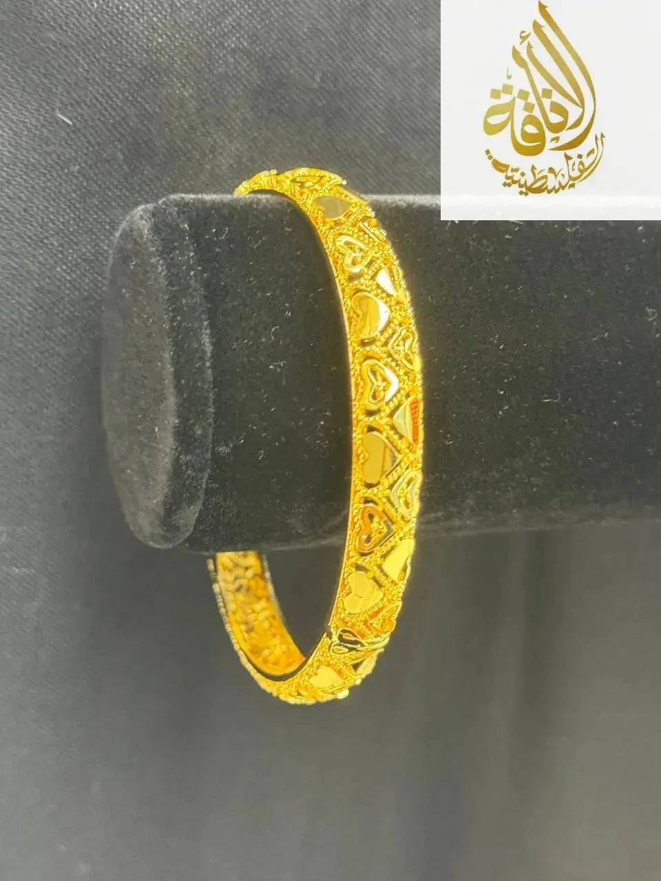 Palestinian Elegance imitated gold heart design gold bangle bracelet with intricate heart patterns