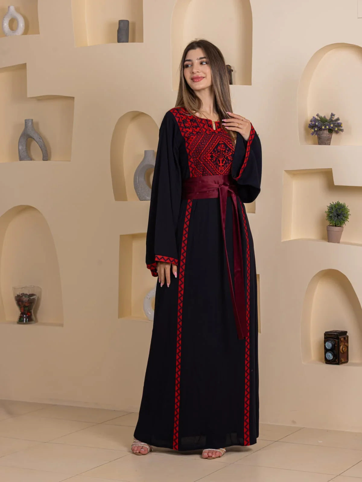 Huda Simply Embroidered Thoub black floor length thobe with red Palestinian embroidery and satin waist sash