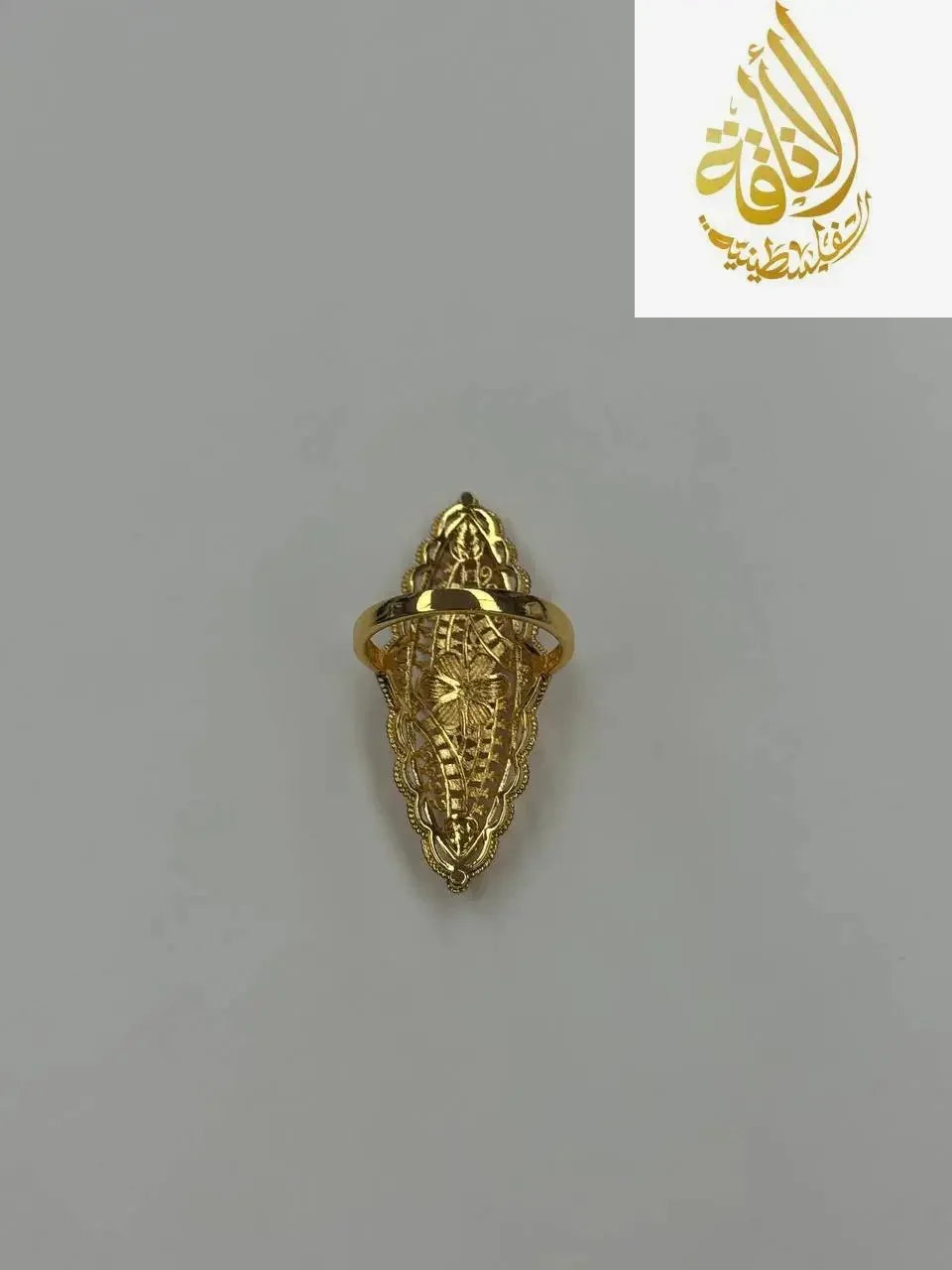 Imitated gold ring from Palestinian Elegance featuring a unique flower ring design with intricate detailing