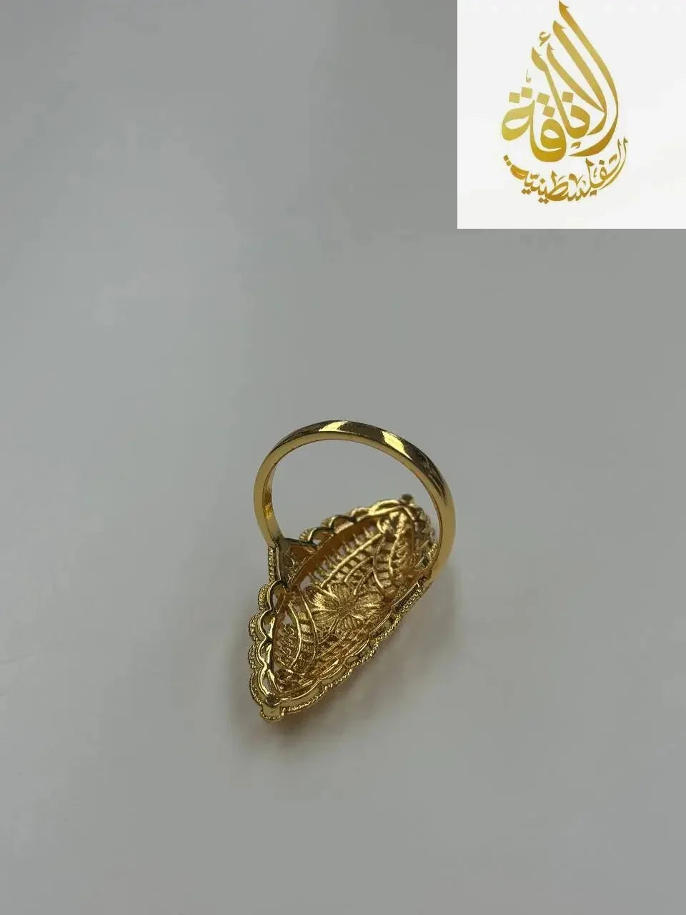 Imitated gold ring by Palestinian Elegance featuring a unique flower ring design with intricate detailing