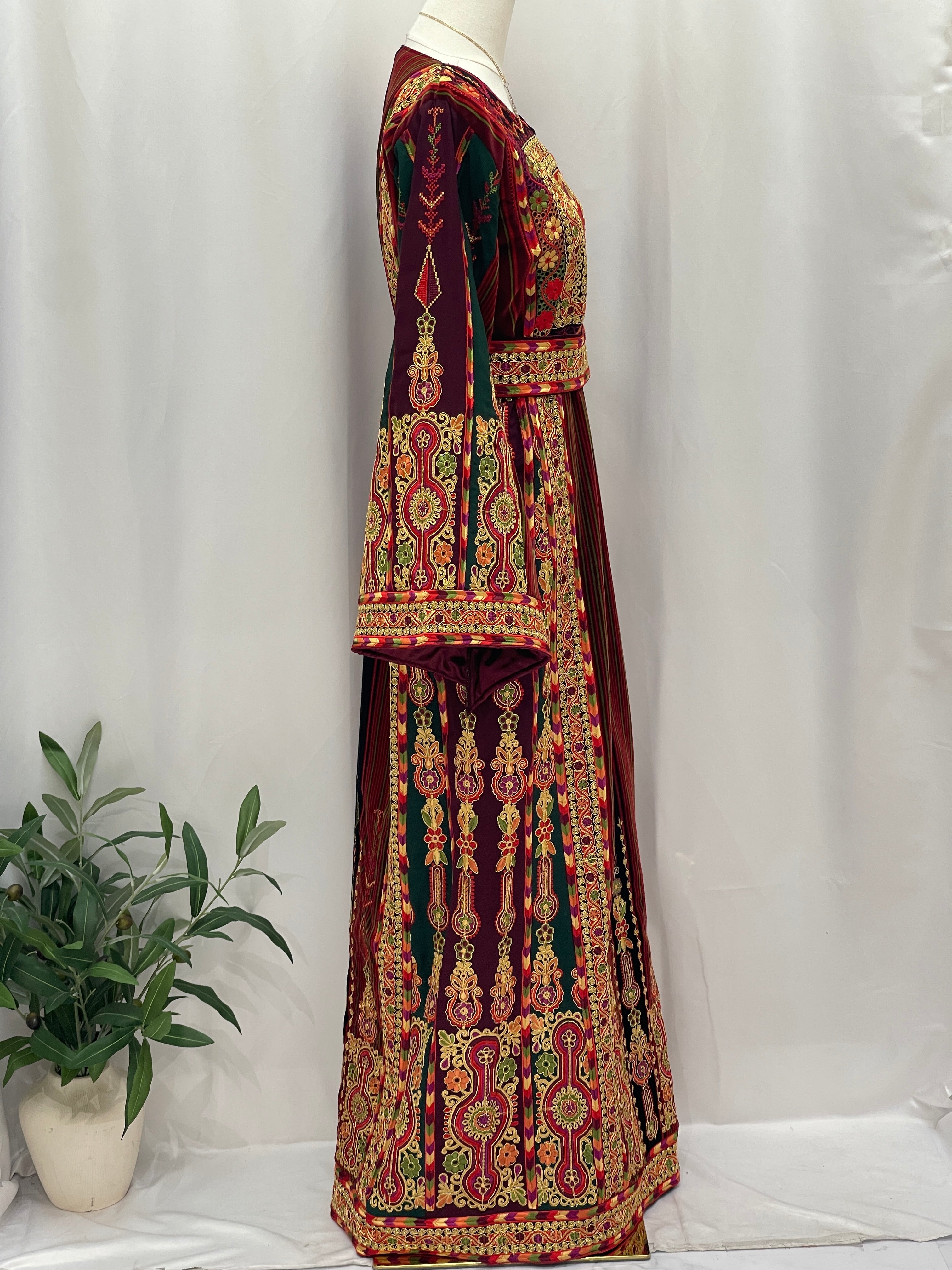 Palestinian Velvet Malaka Embroidered Thobe with intricate traditional red and gold embroidery and long flowing sleeves