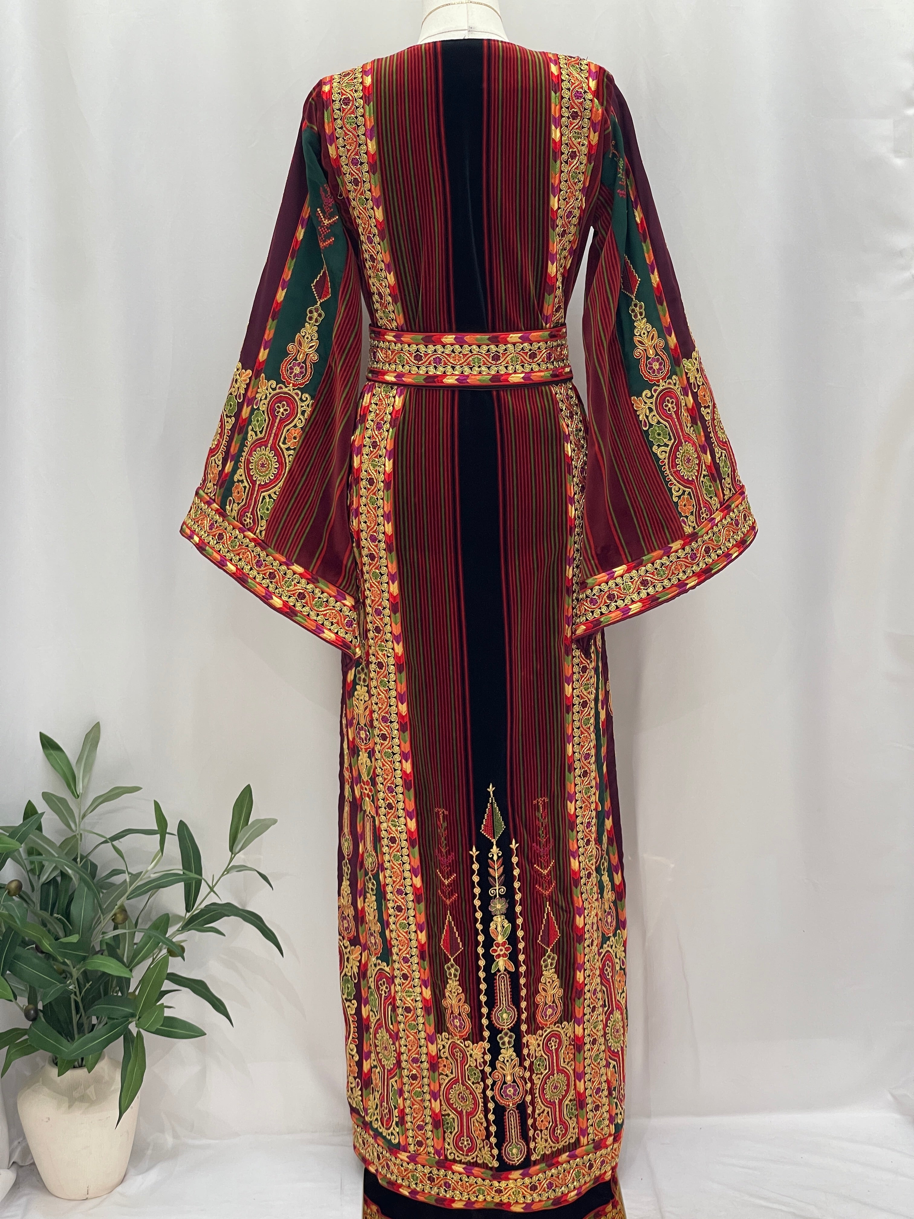 Palestinian Velvet Malaka Embroidered Thobe by Palestinian Elegance in rich velvet with gold embroidery and traditional patterns