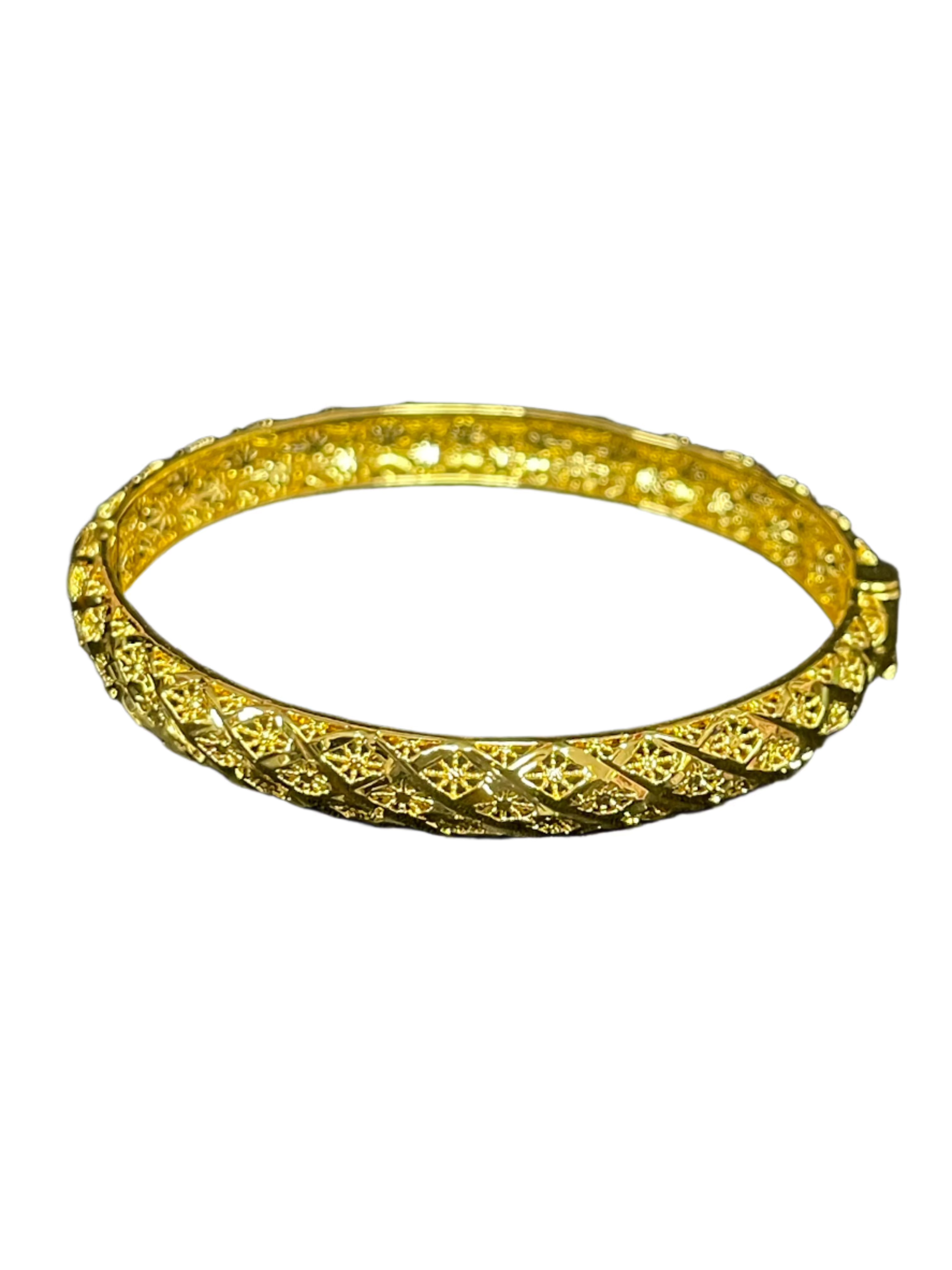 Palestinian gold bangle bracelet with intricate imitated gold design by Palestinian Elegance