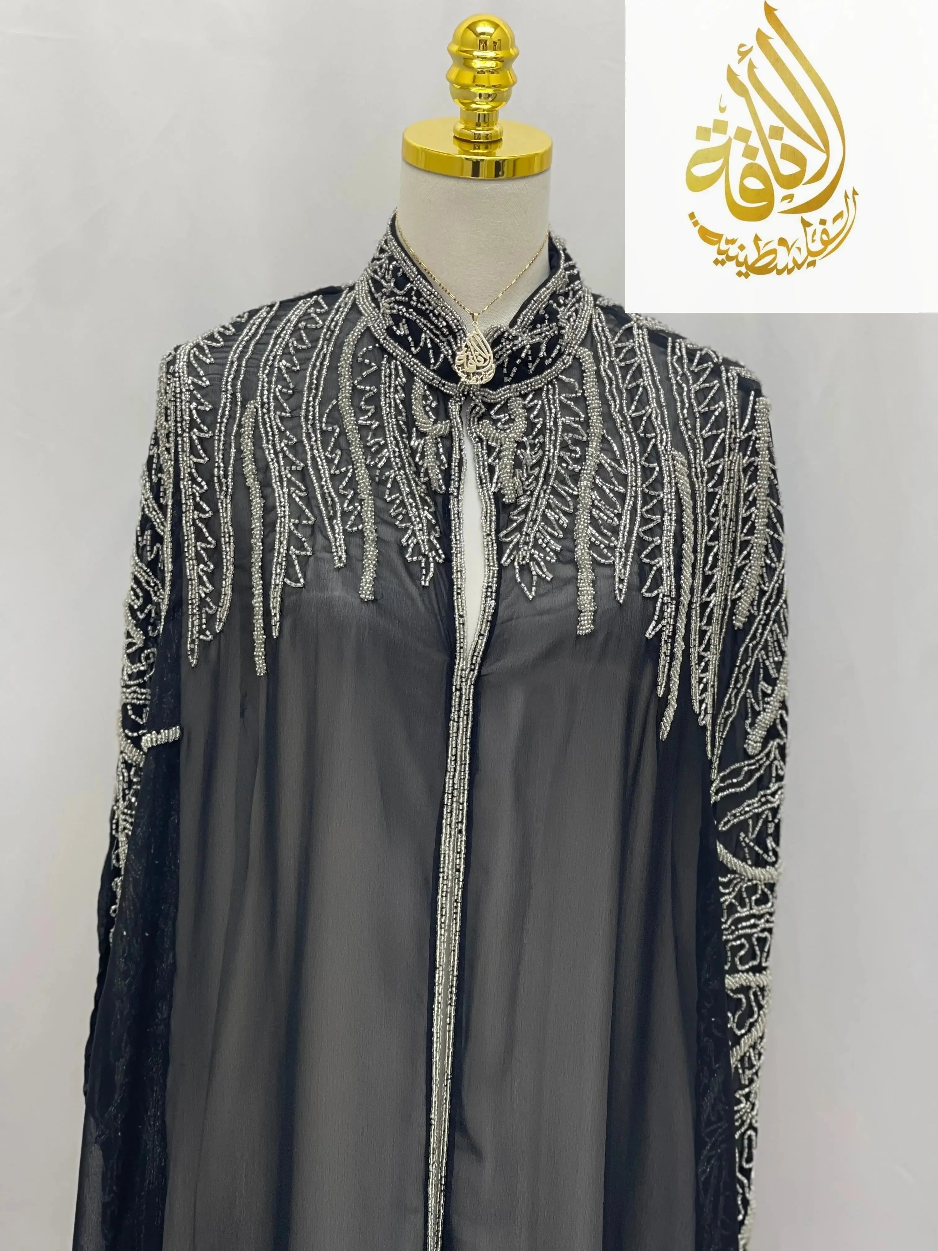 Palestinian Elegance Karam Fancy Beads Cape cardigan with intricate silver bead embroidery on black sheer fabric