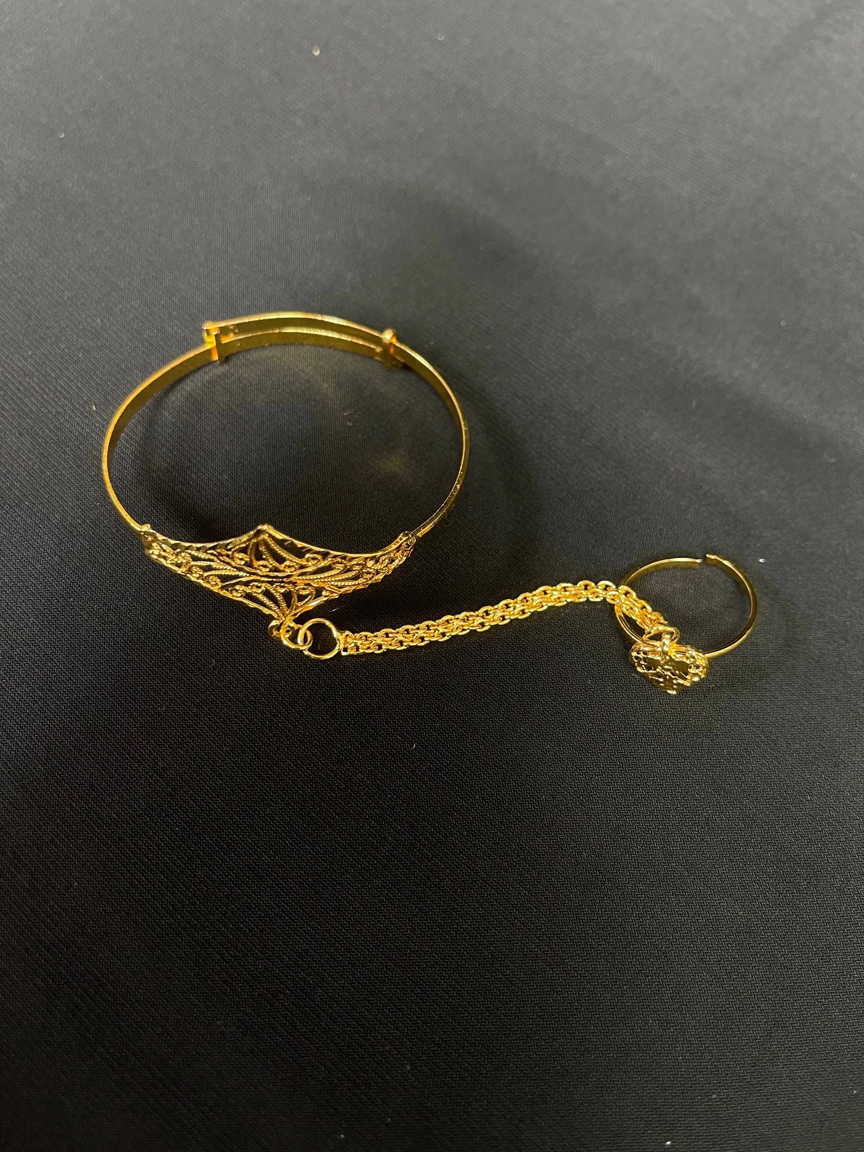 Kids Imitated Gold Bracelet with Adjustable Ring featuring intricate design and connected by a delicate chain