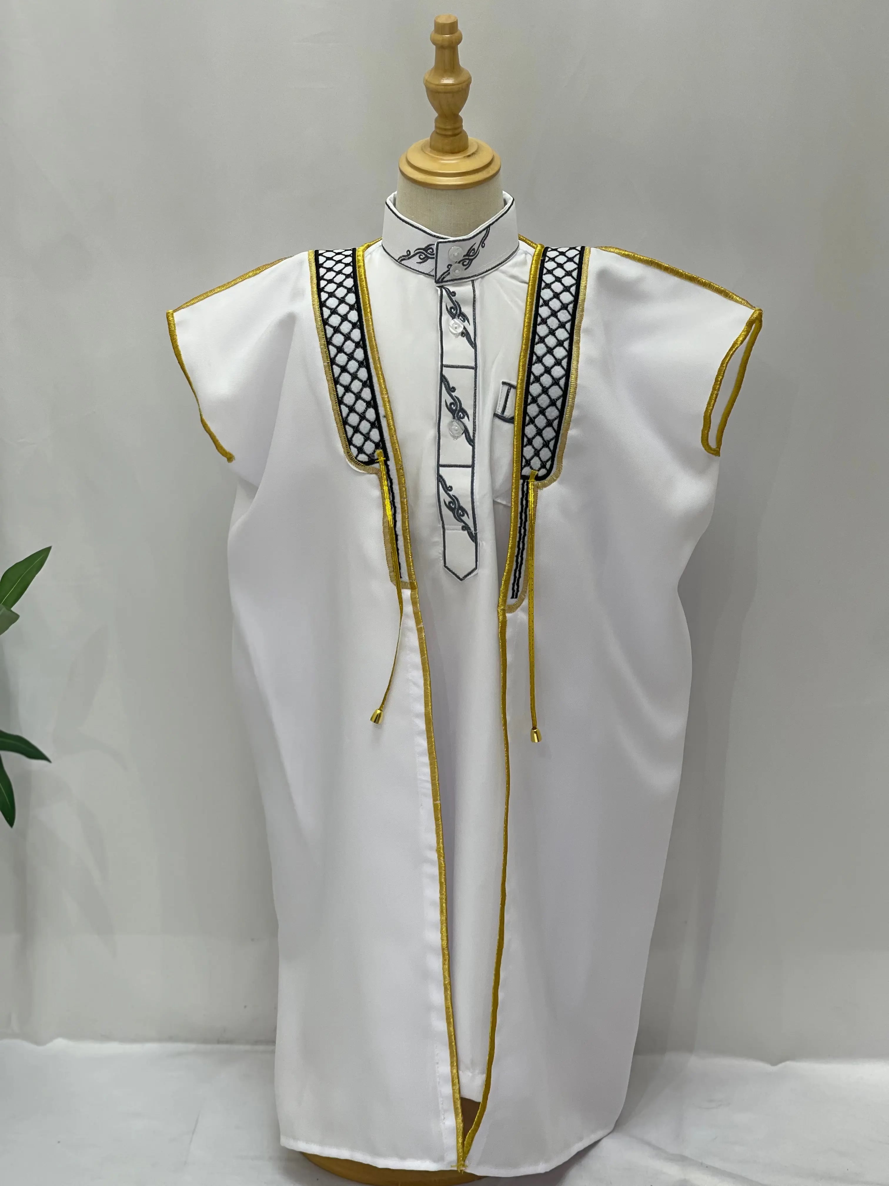White Kids Kuffiyeh Bisht with gold trim and black patterned details displayed on a mannequin