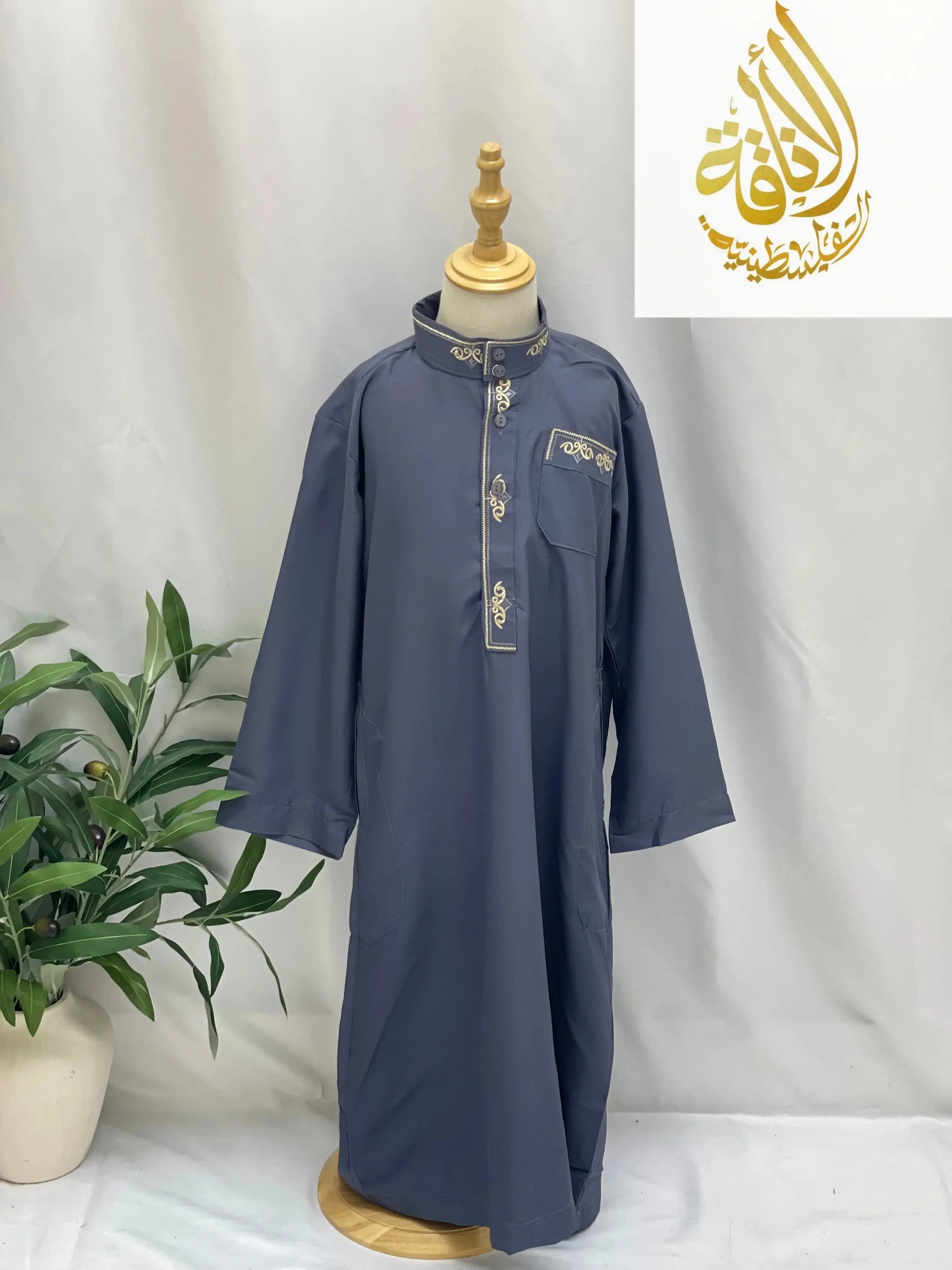 Palestinian Elegance kids embroidered thobe in navy with gold embroidery on collar and pocket