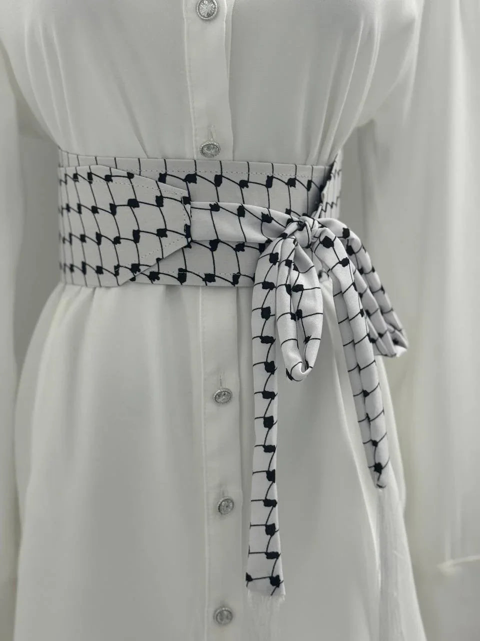 Kufiya Identity Belt in white and black pattern, perfect for stylish and cultural outfits