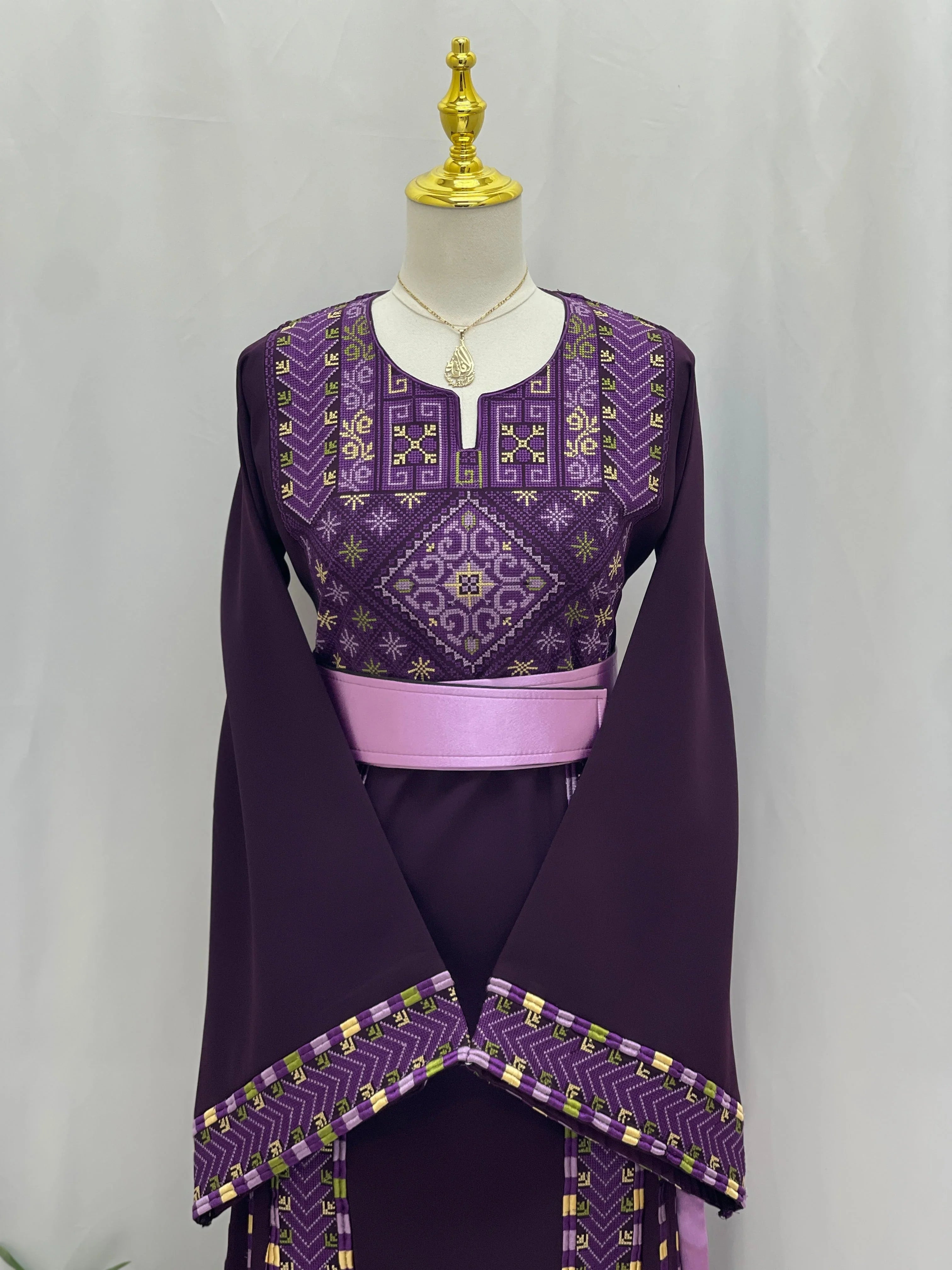 Lavender Heritage Embroidered Thobe featuring intricate embroidery and elegant sleeves
