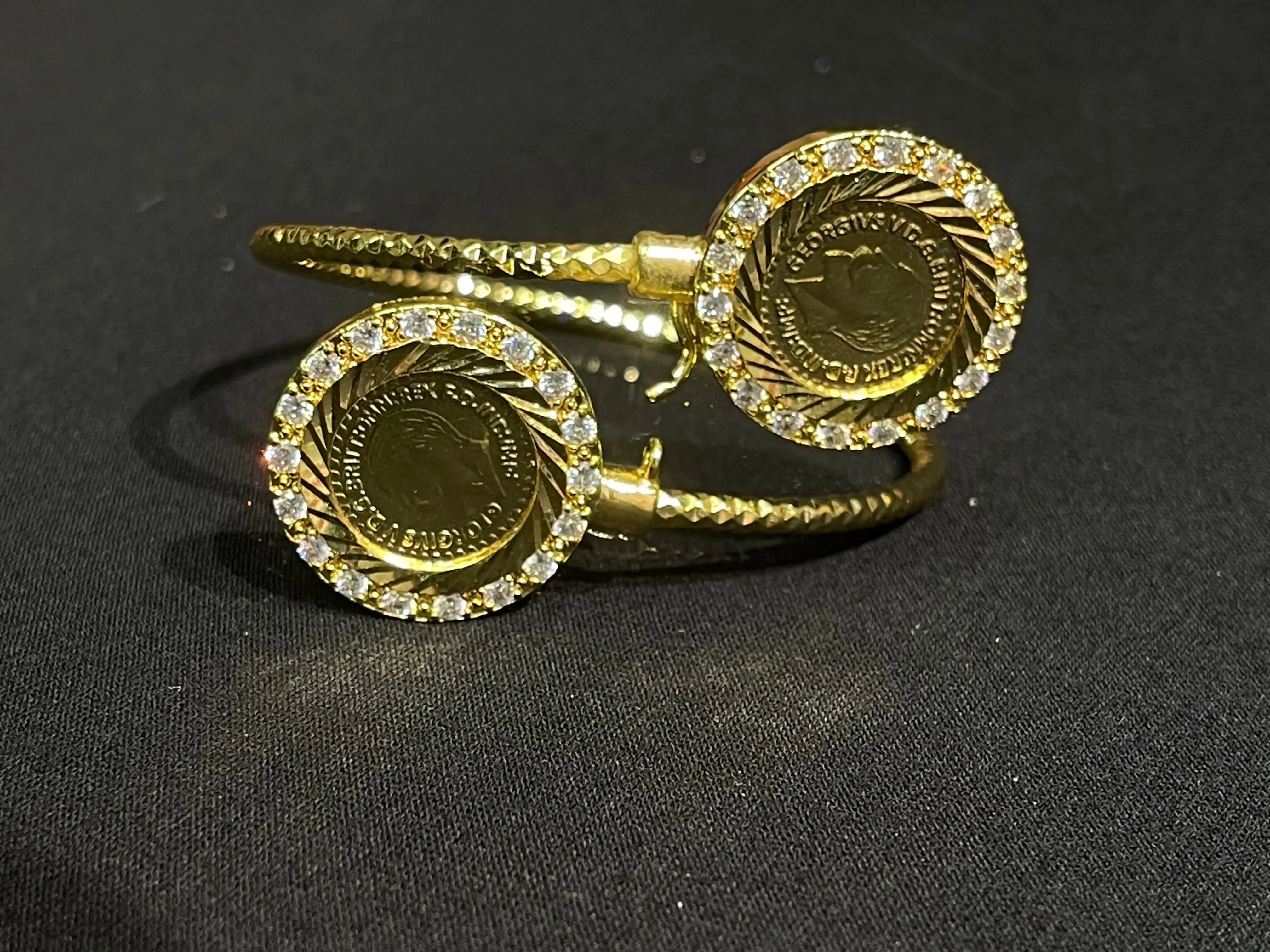 Lera Mabroma Rhinestone Bracelet imitated gold with round coin design and sparkling rhinestones