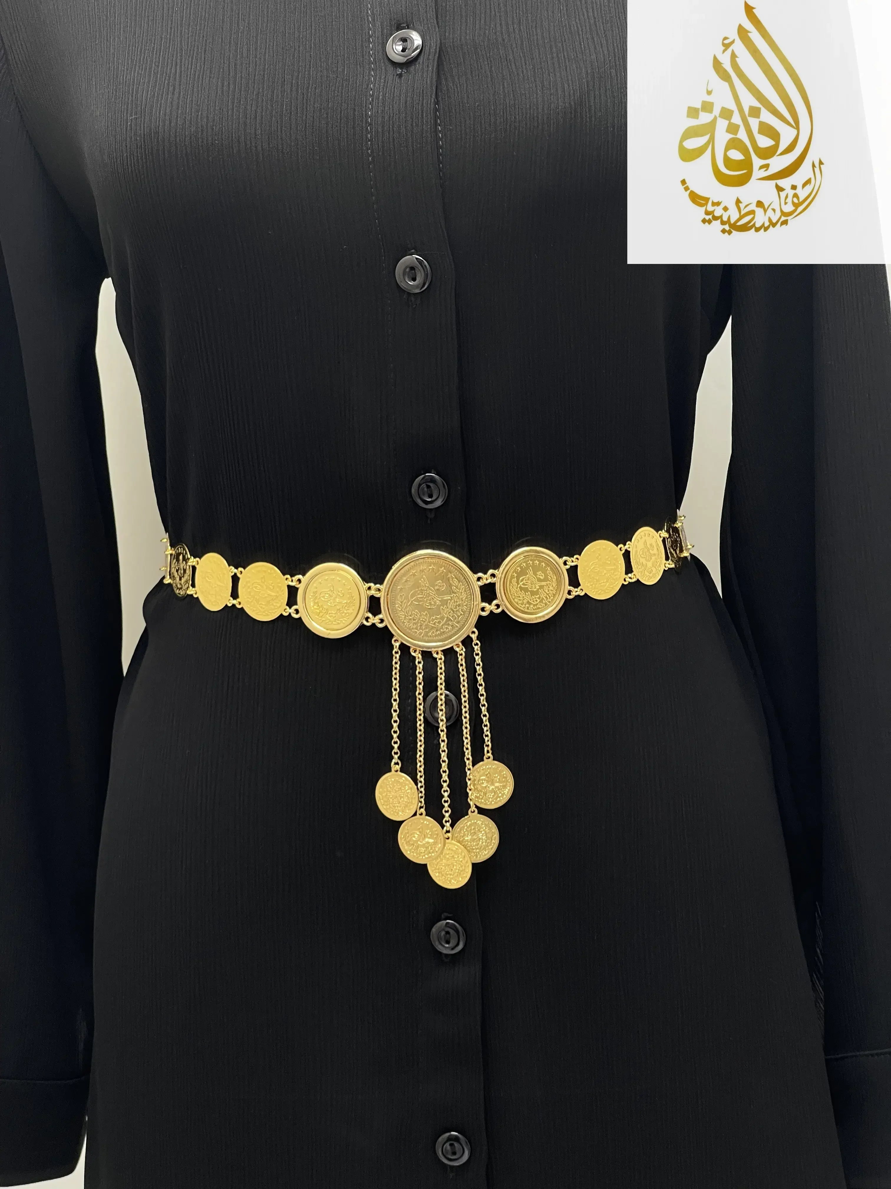 Lerat Belt with Mkhamas Imitated Gold by Palestinian Elegance worn over black buttoned dress