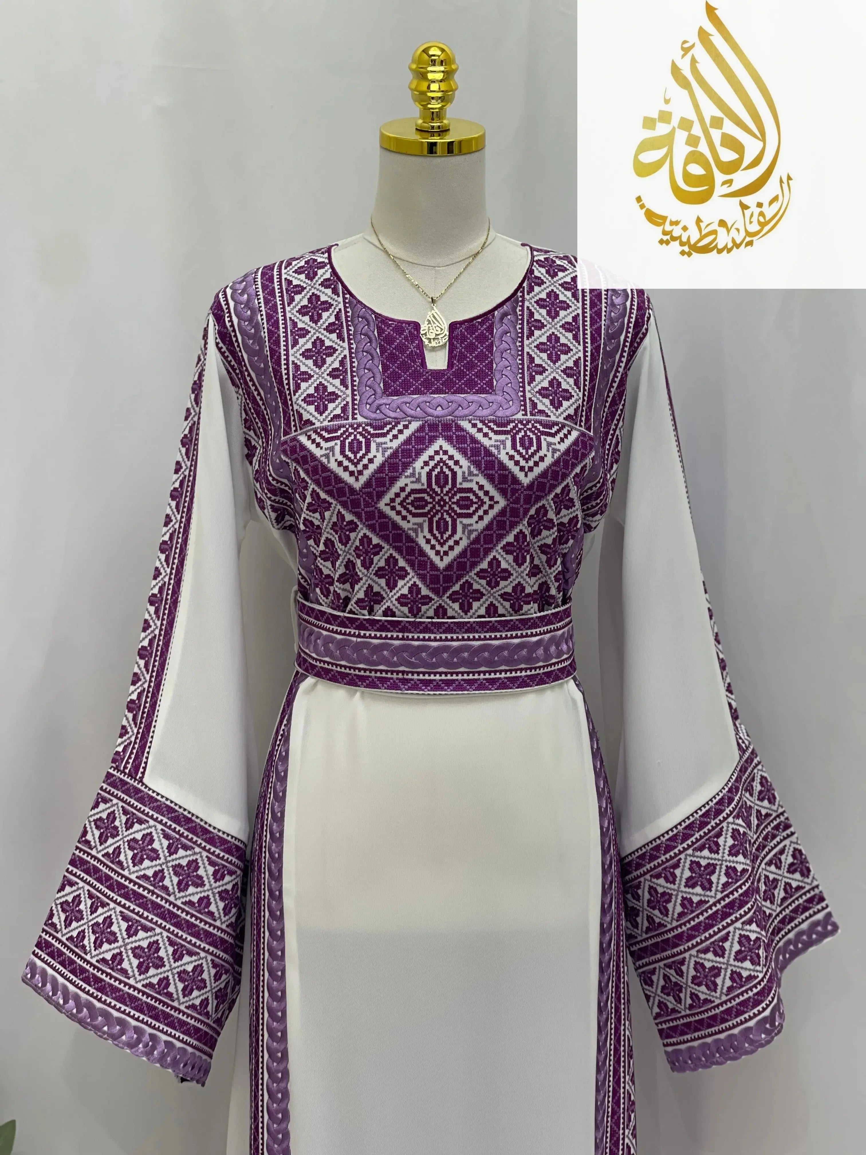 Lilac Embroidered Unique Thoub with detailed geometric patterns and wide sleeves from Palestinian Elegance