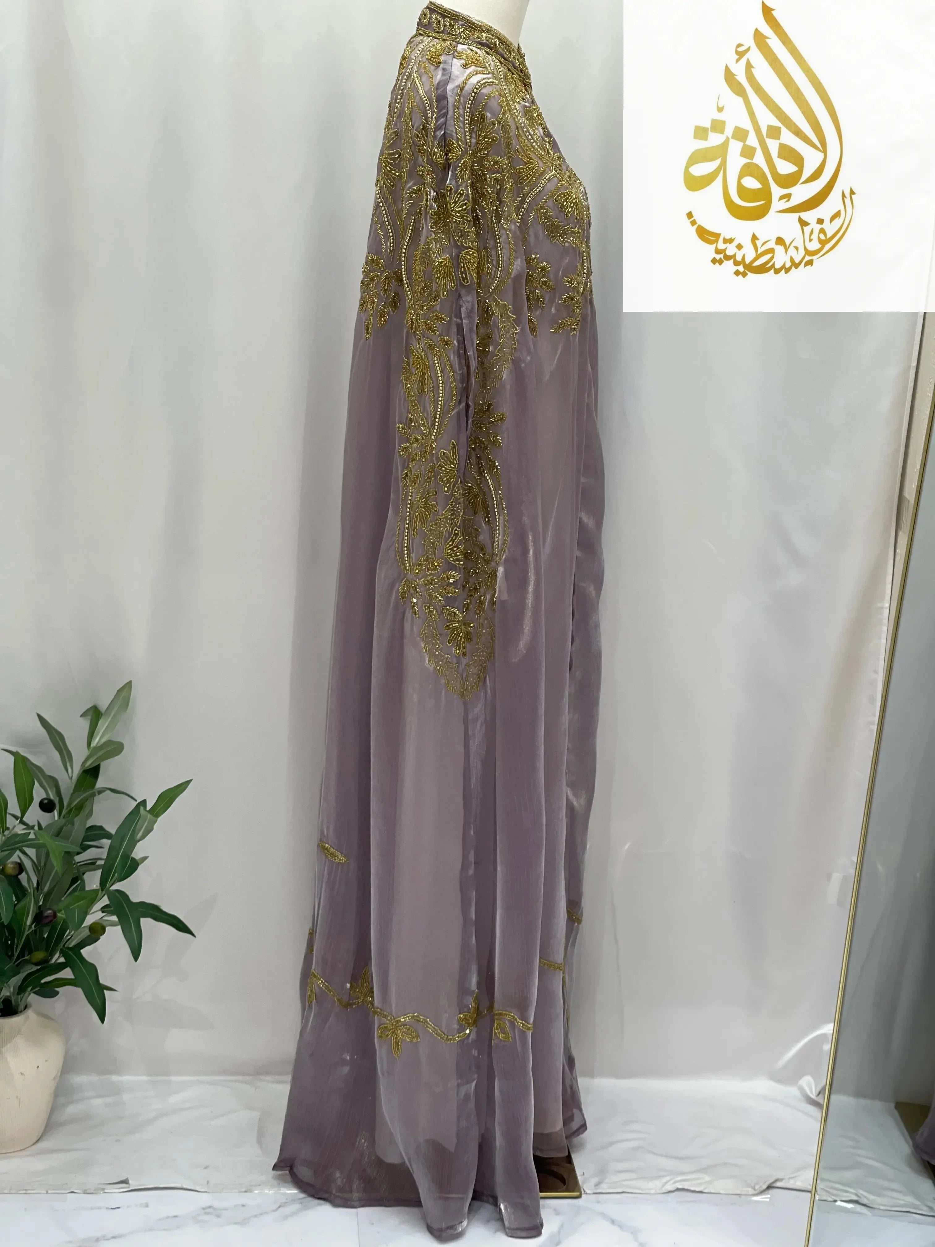 Regal Frosted Lavender Cape cardigan by Palestinian Elegance with intricate gold embroidery and flowing design