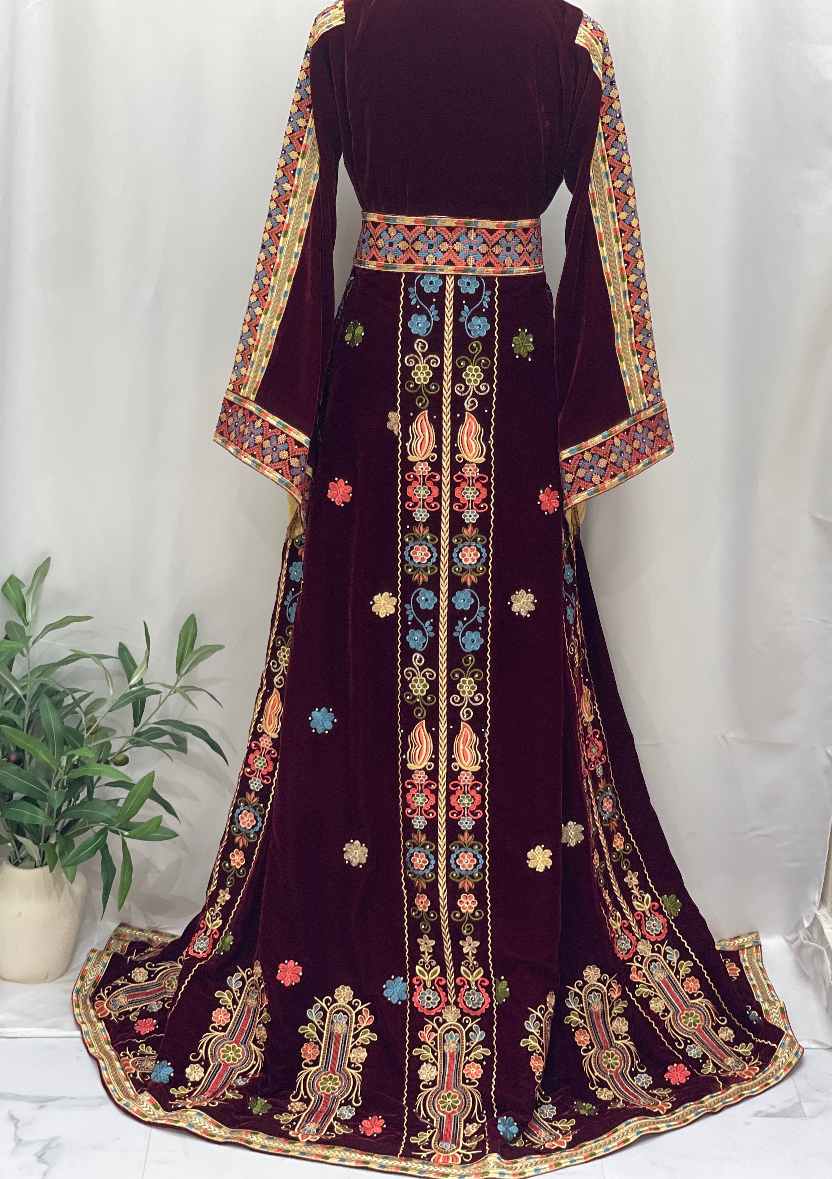 Maise Velevt Embroidered Thoub in dark burgundy with intricate floral designs and elegant sleeves