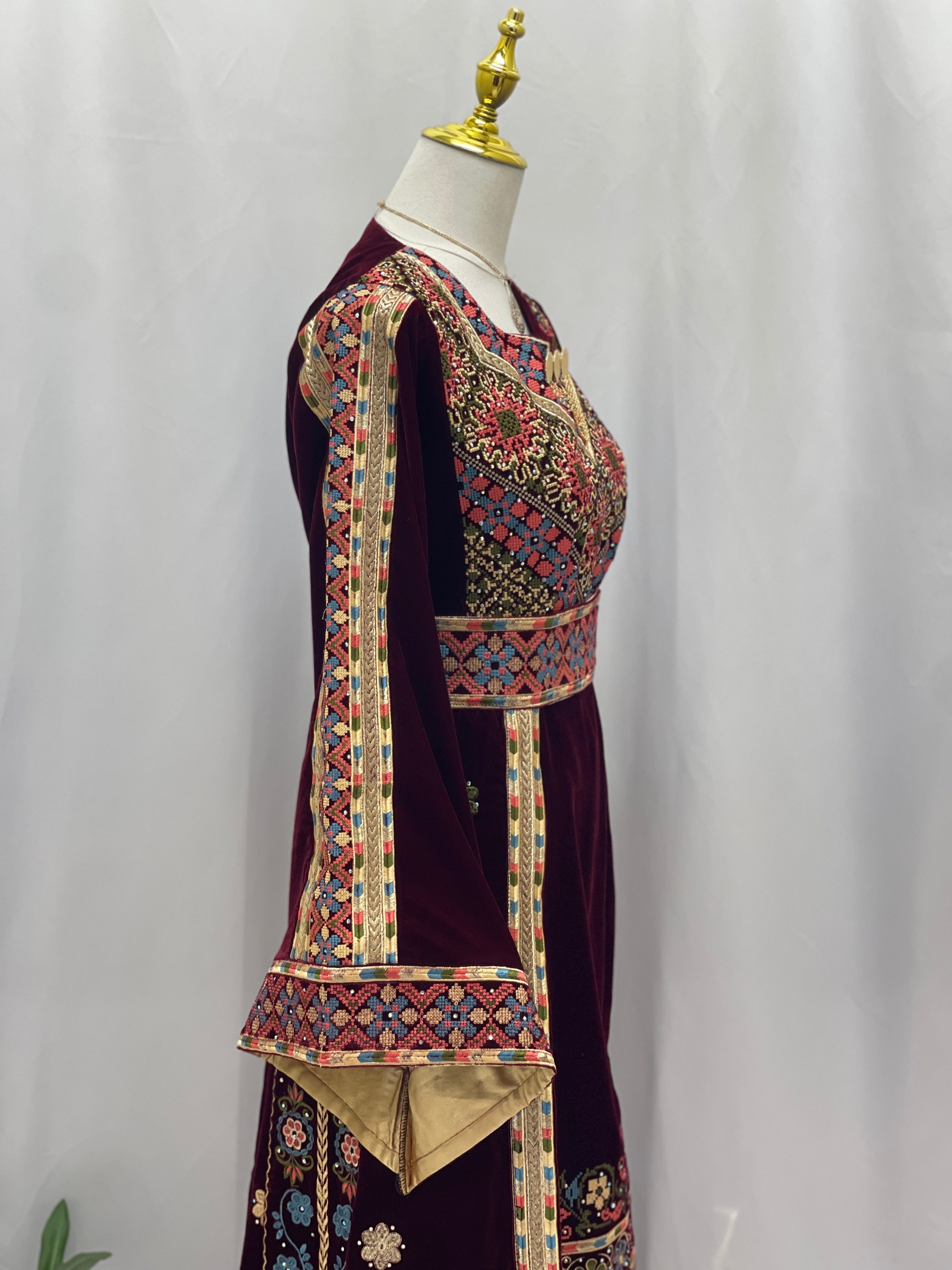 Maise Velevt Embroidered Thoub in burgundy with intricate floral designs and elegant bell sleeves