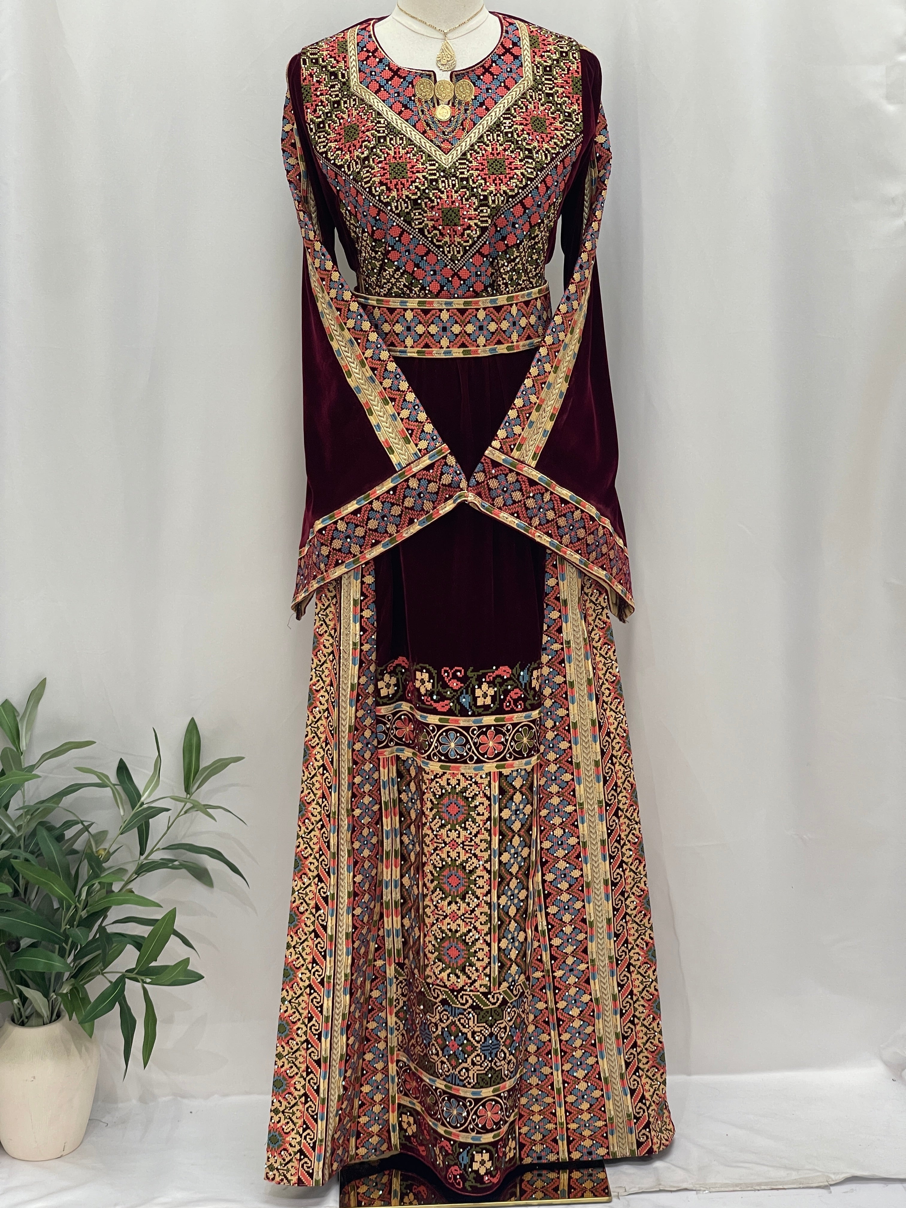 Maise Velevt Embroidered Thoub in rich colors with intricate floral designs and elegant sleeves