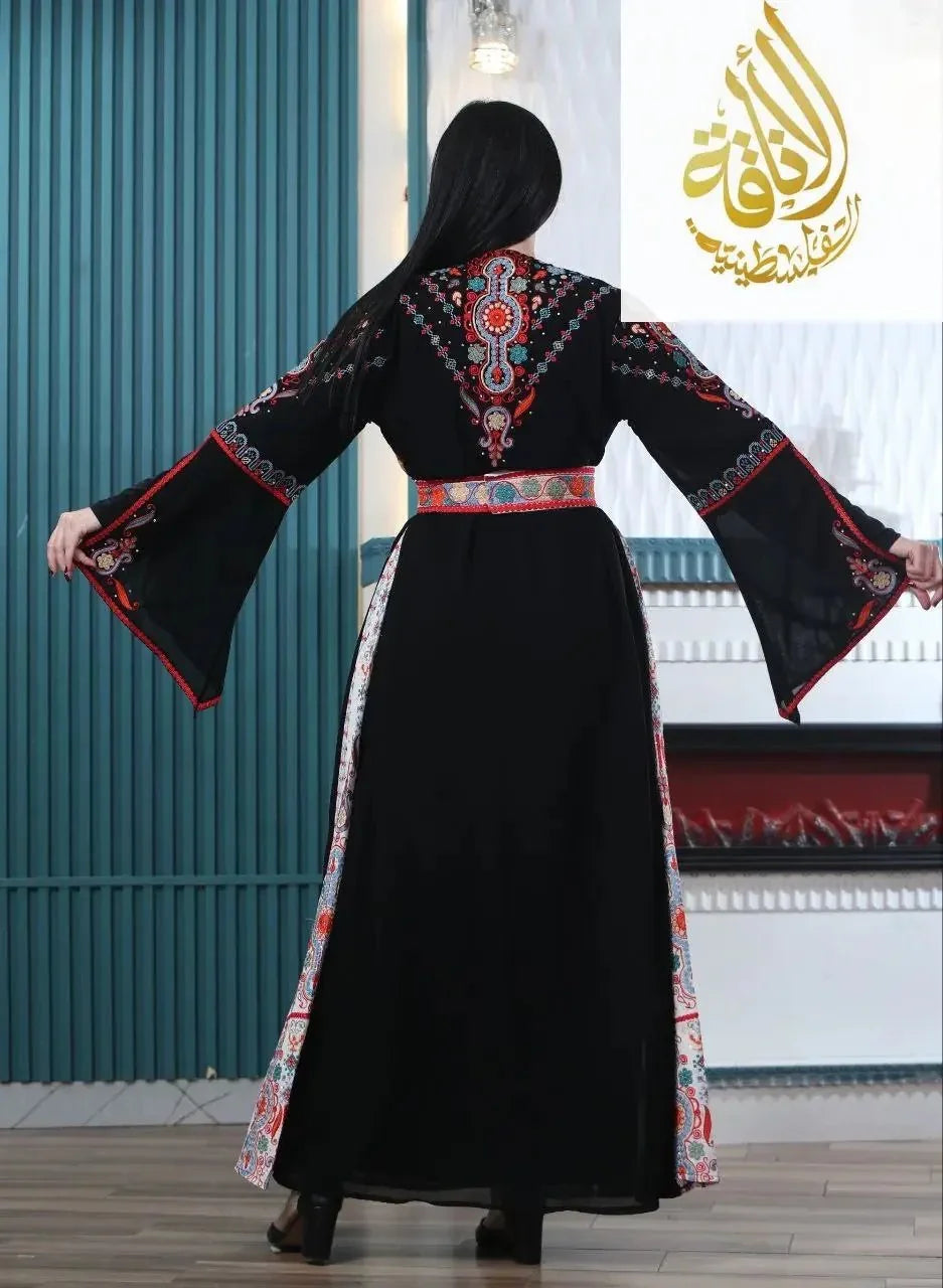 Black Malaki embroidered kaftan by Palestinian Elegance with colorful detailed embroidery on sleeves and back