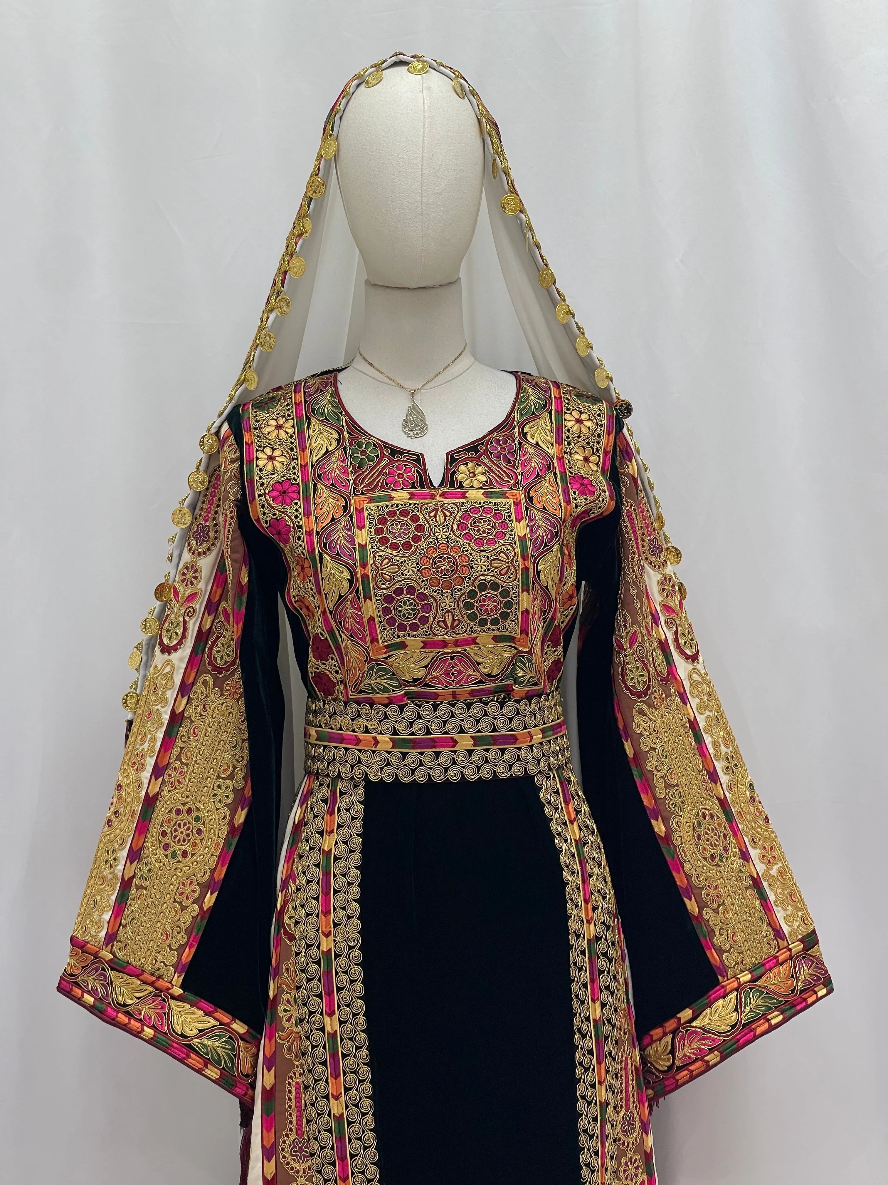 Malika Queen Emerald Thobe with intricate embroidery and elegant design for cultural occasions