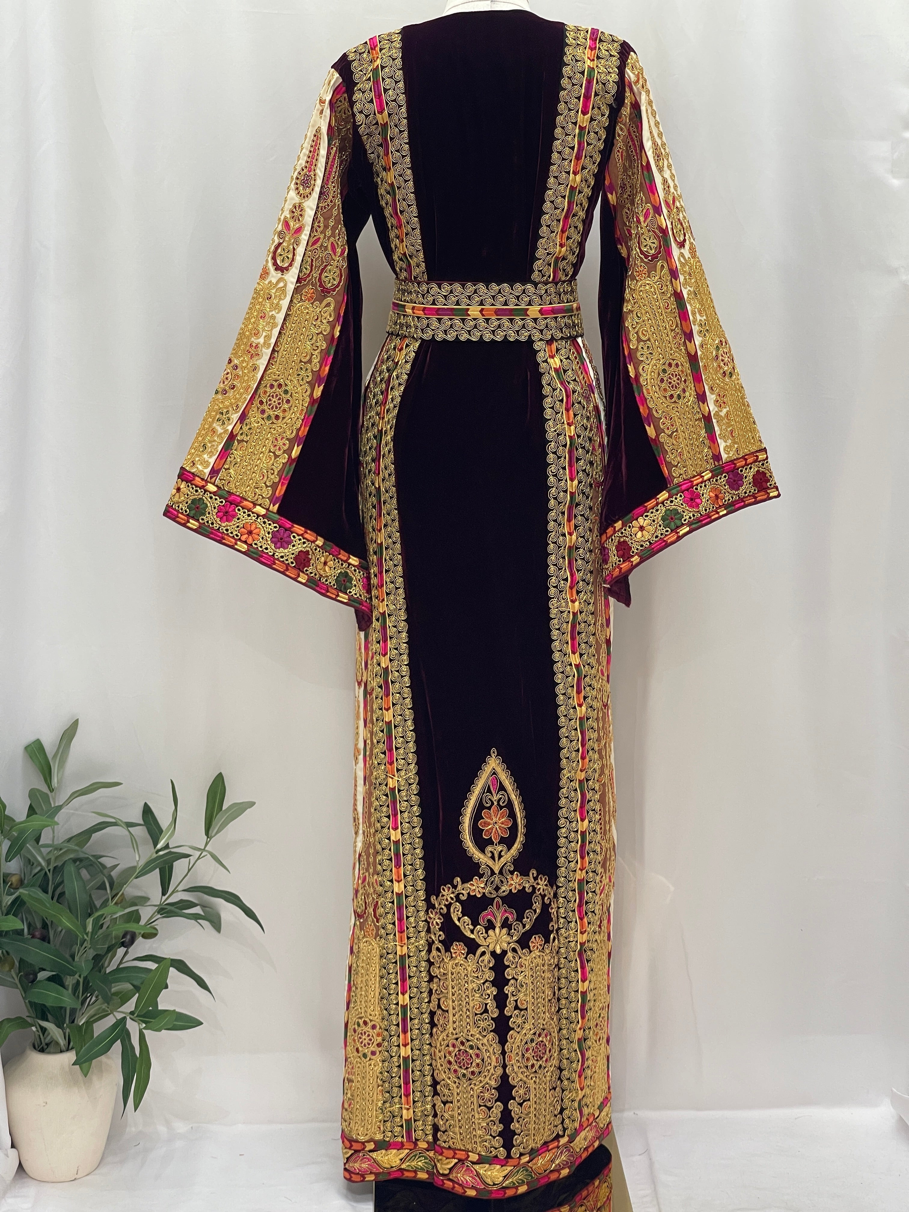 Back view of Malikat al-Turath Thoub with intricate embroidery and elegant design by Palestinian Elegance