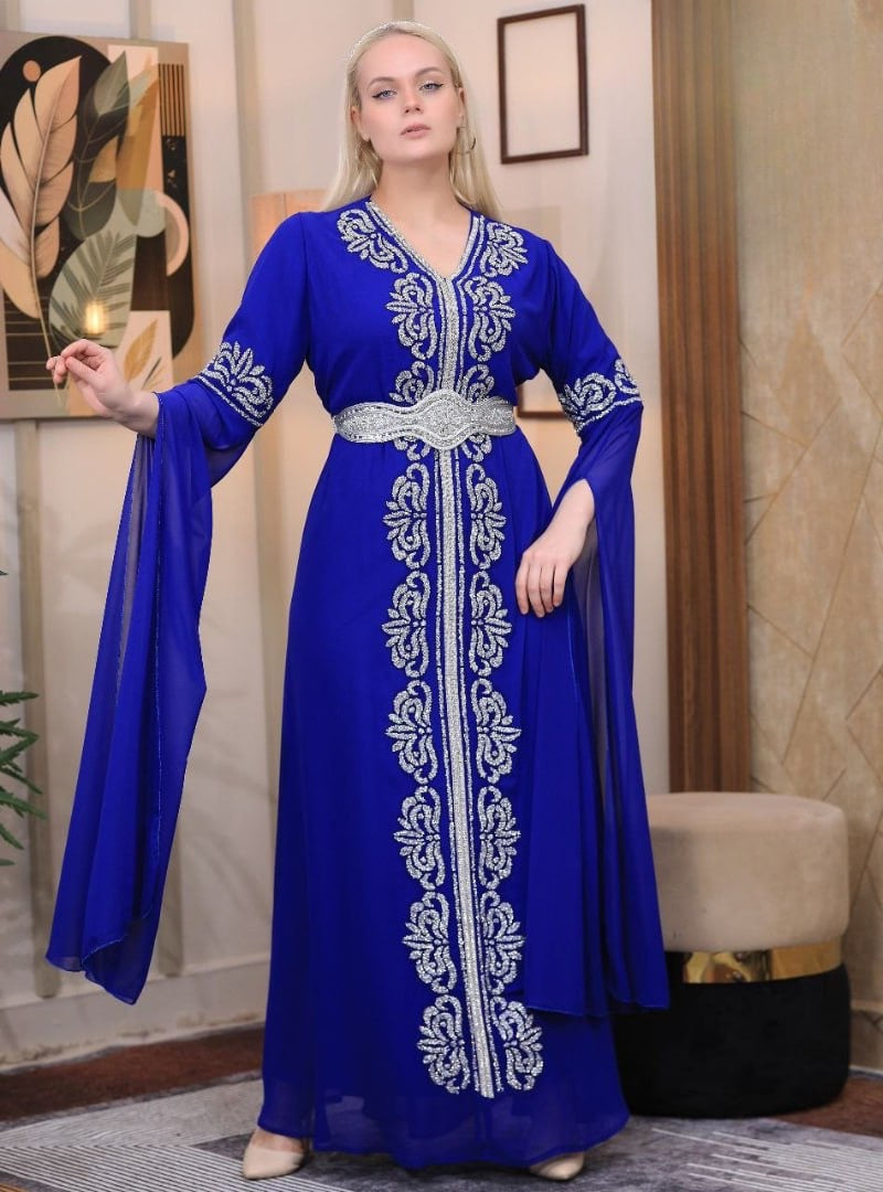 Palestinian Elegance blue embroidered kaftan dress with silver detailing and flowing sleeves