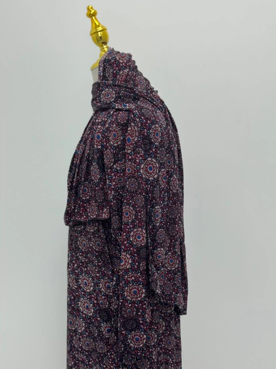Palestinian Elegance Full Prayer Dress side view on mannequin in burgundy mandala print with matching headscarf