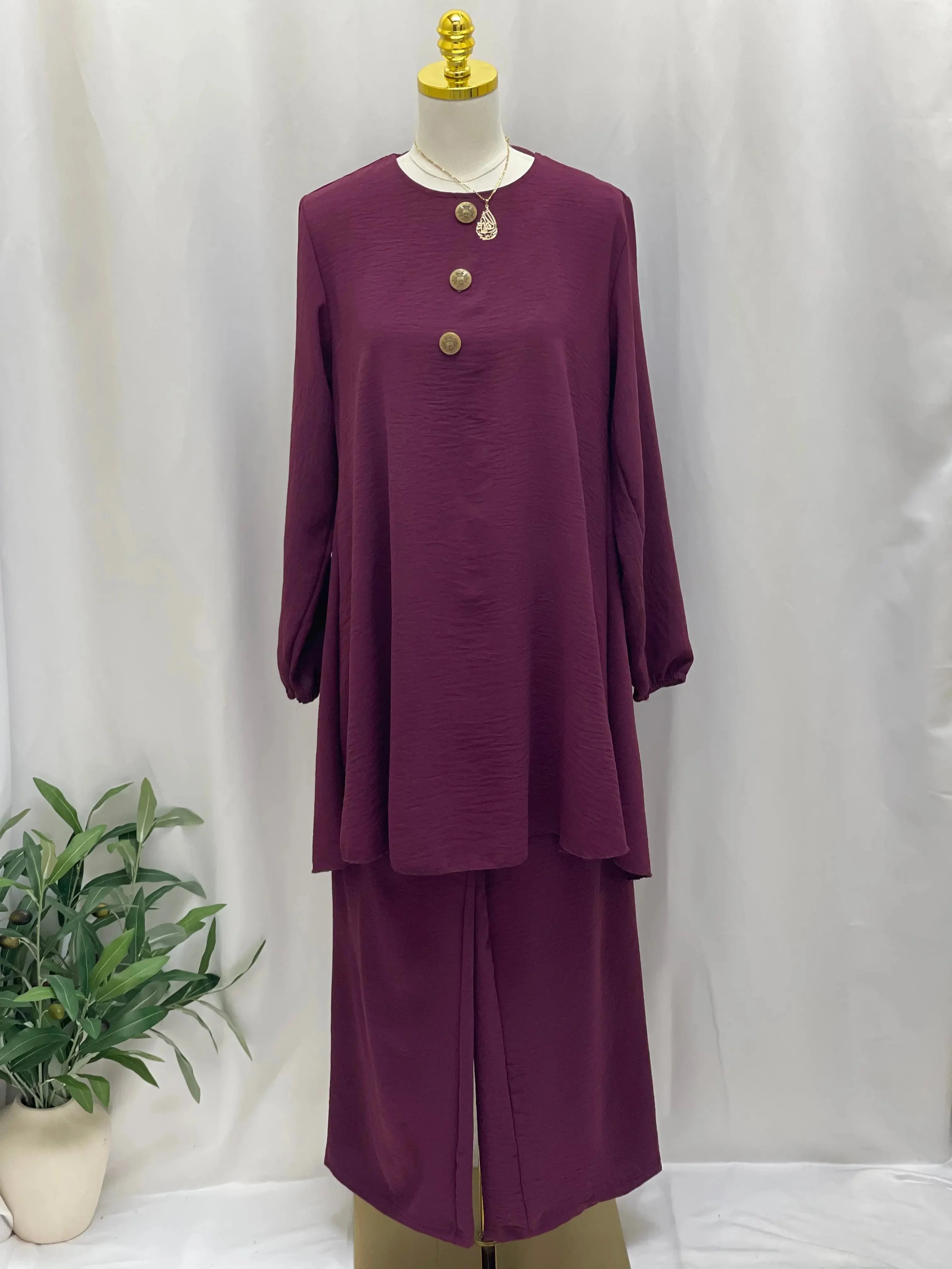 Palestinian Elegance modest long tunic and pant set in deep plum with button details and long sleeves