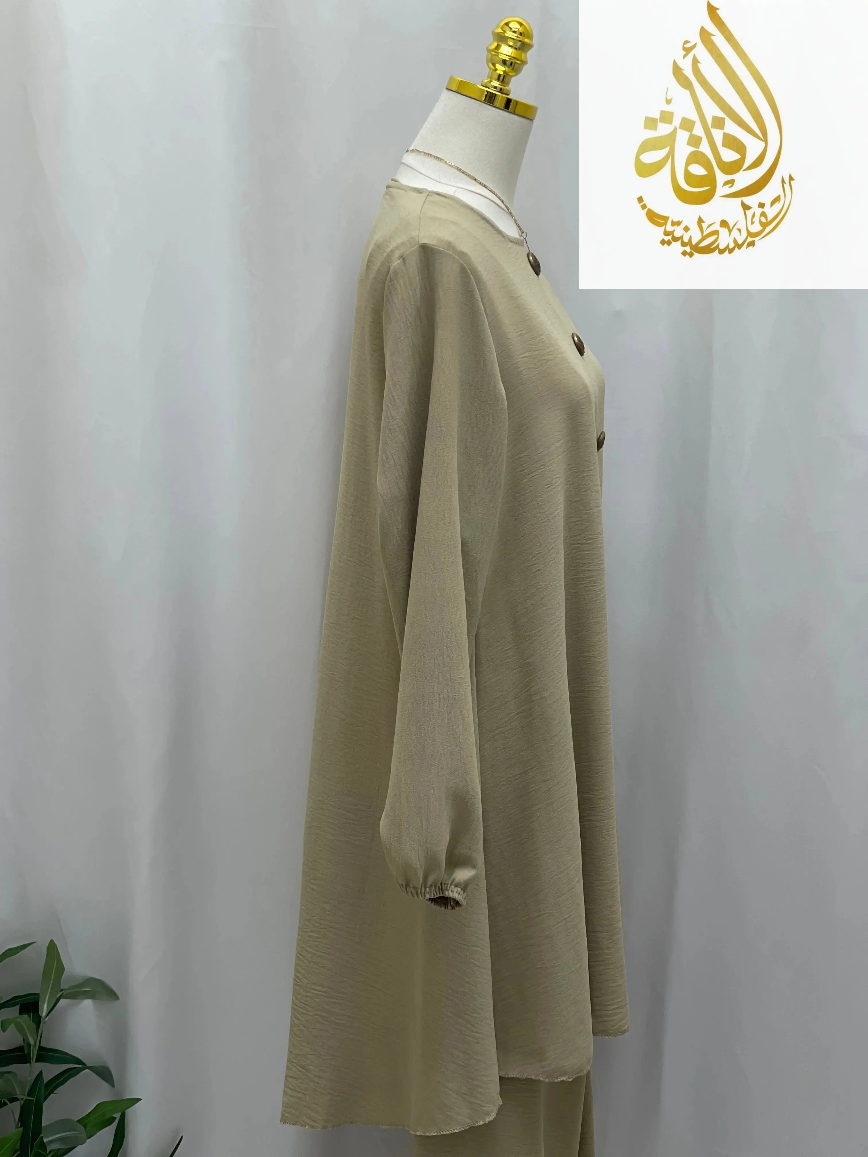 Palestinian Elegance modest long tunic and pant set in beige with button details on side view