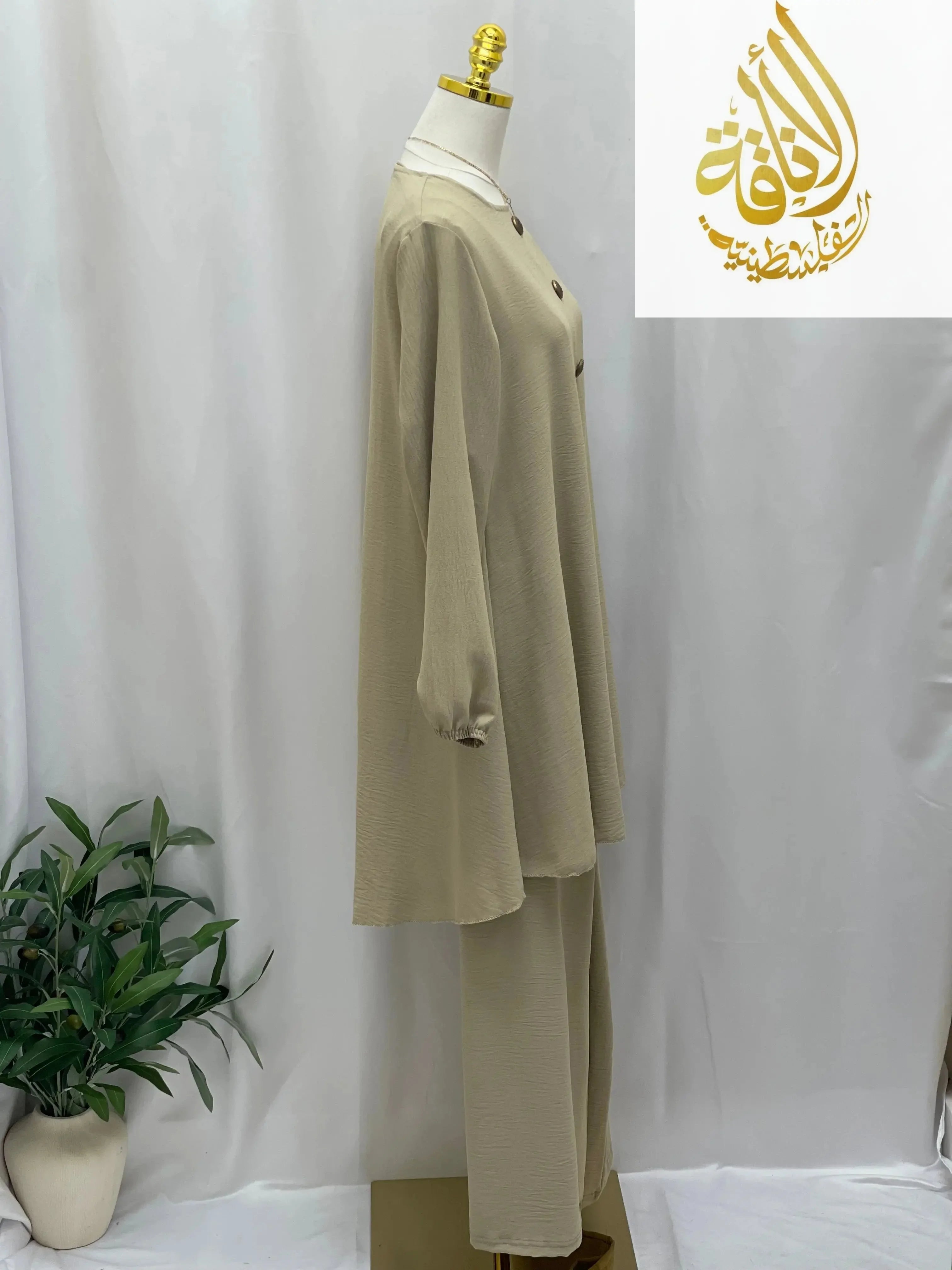 Palestinian Elegance modest long tunic and pant set in beige casual style on mannequin