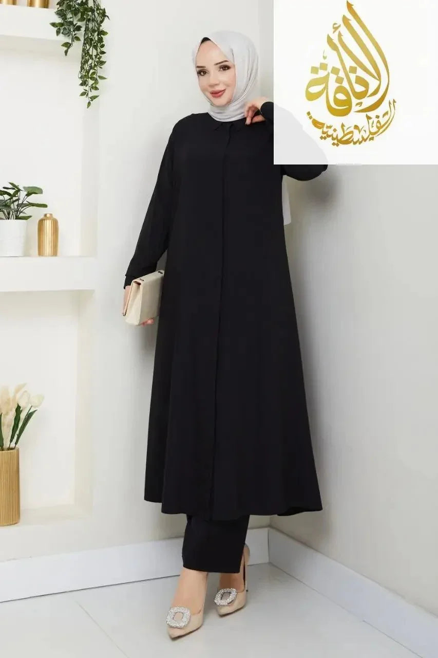 Palestinian Elegance modesty long set featuring a black modest outfit set with long sleeves and flowing design