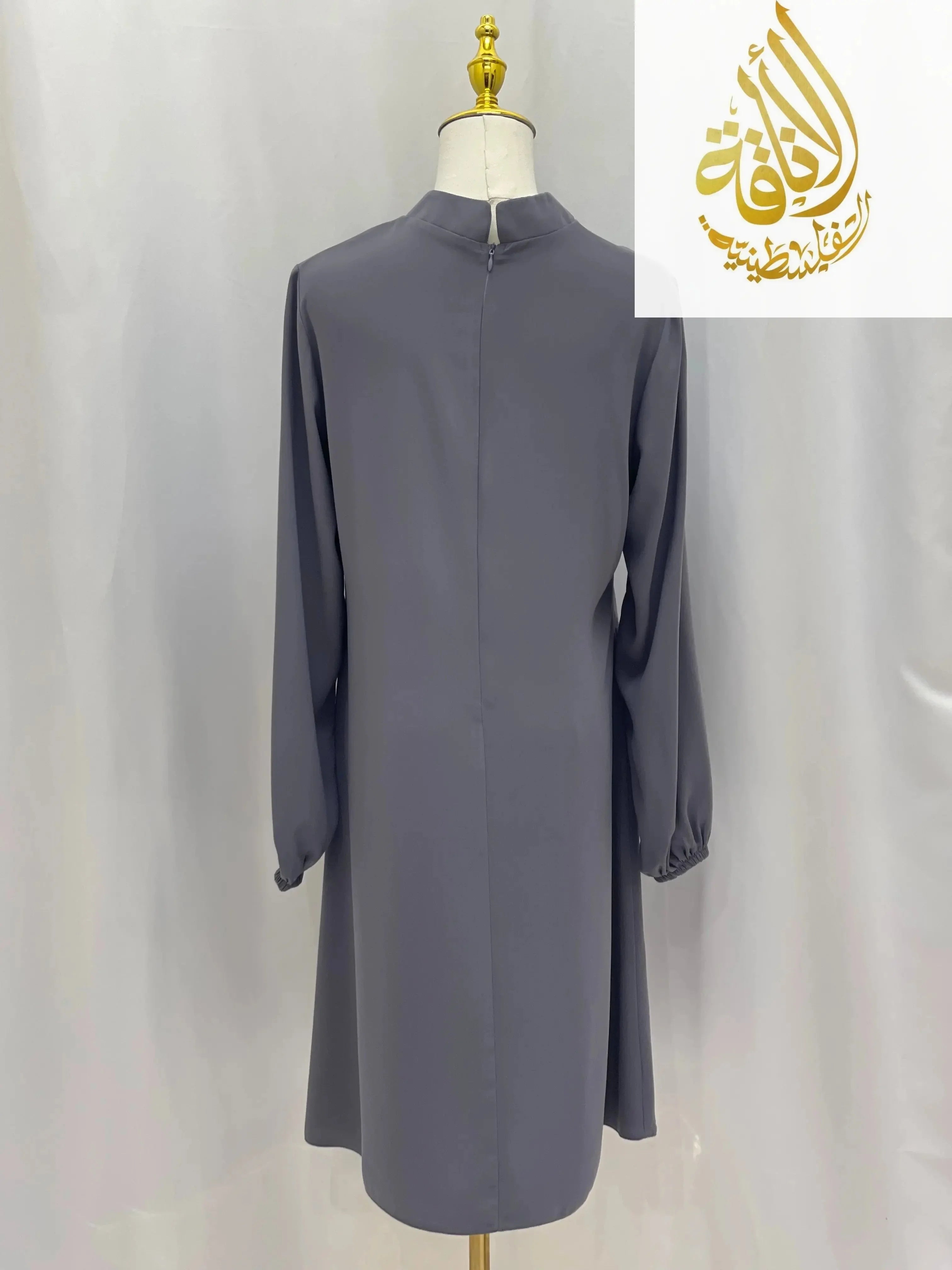 Palestinian Elegance modest embroidered tunic dress in gray with long sleeves and back zipper closure