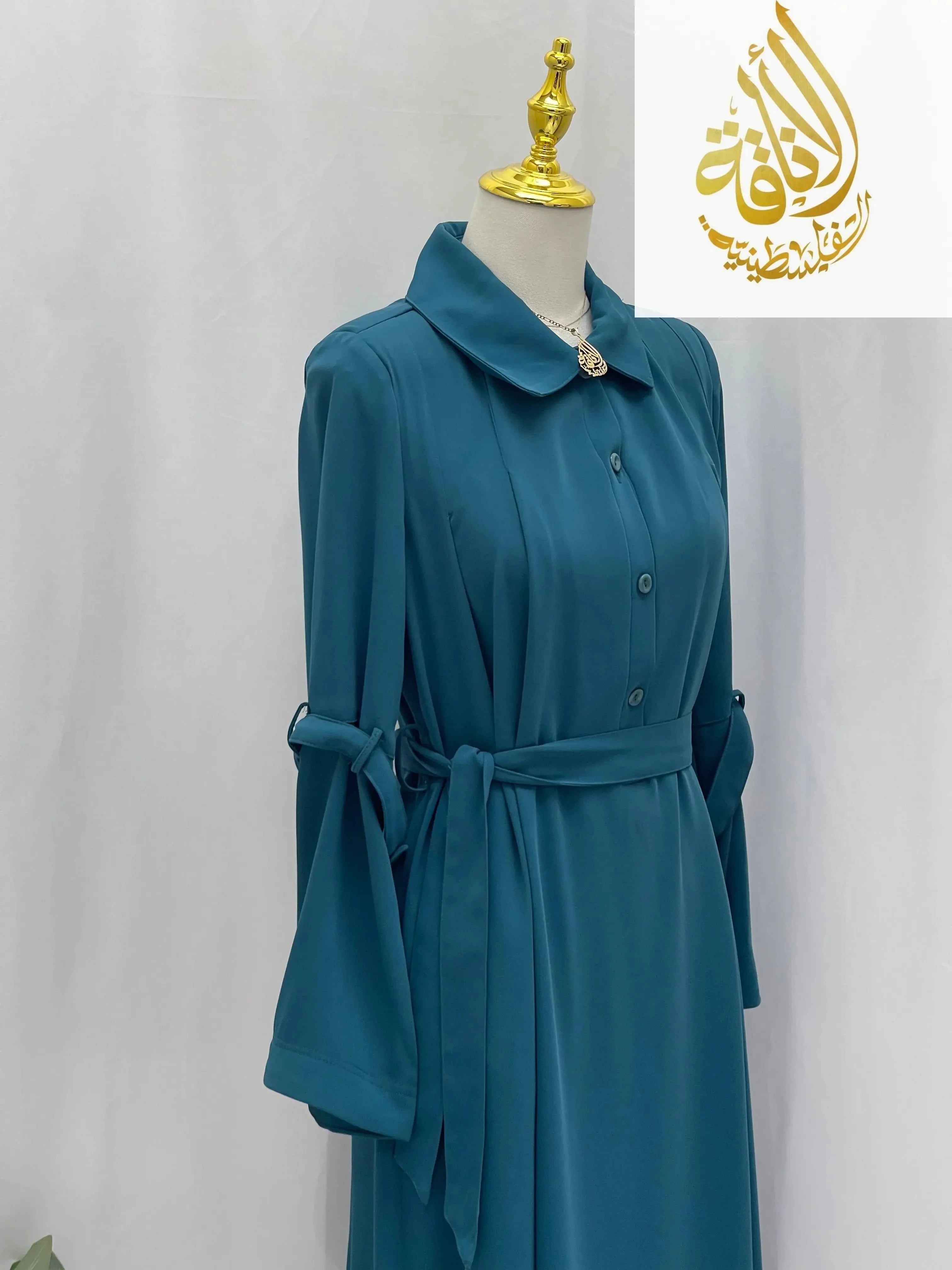 Palestinian Elegance teal abaya with button front and waist tie modesty summer dress