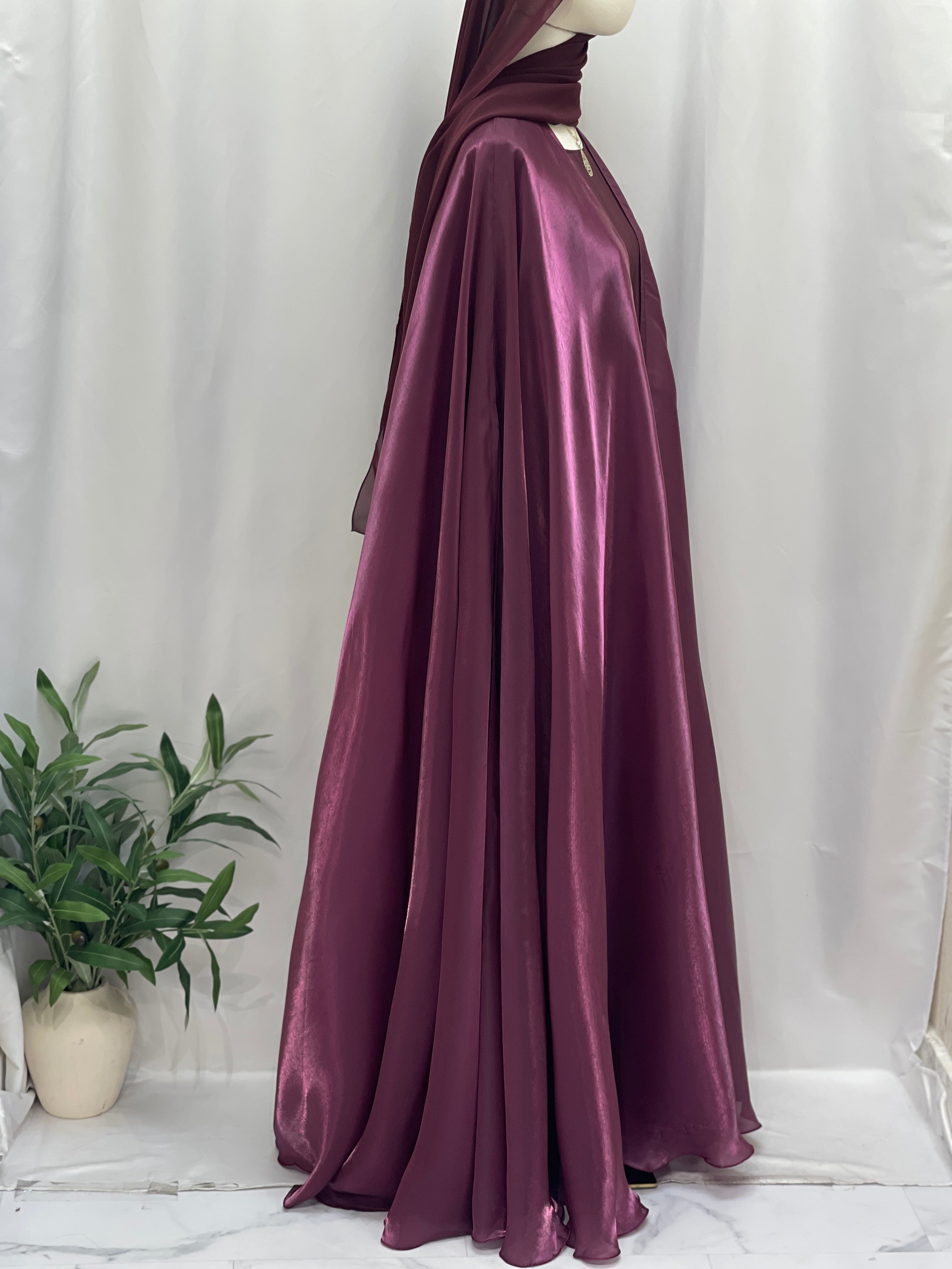 Palestinian Elegance Moonlit Organza Abaya in rich purple with flowing lightweight fabric and elegant draping