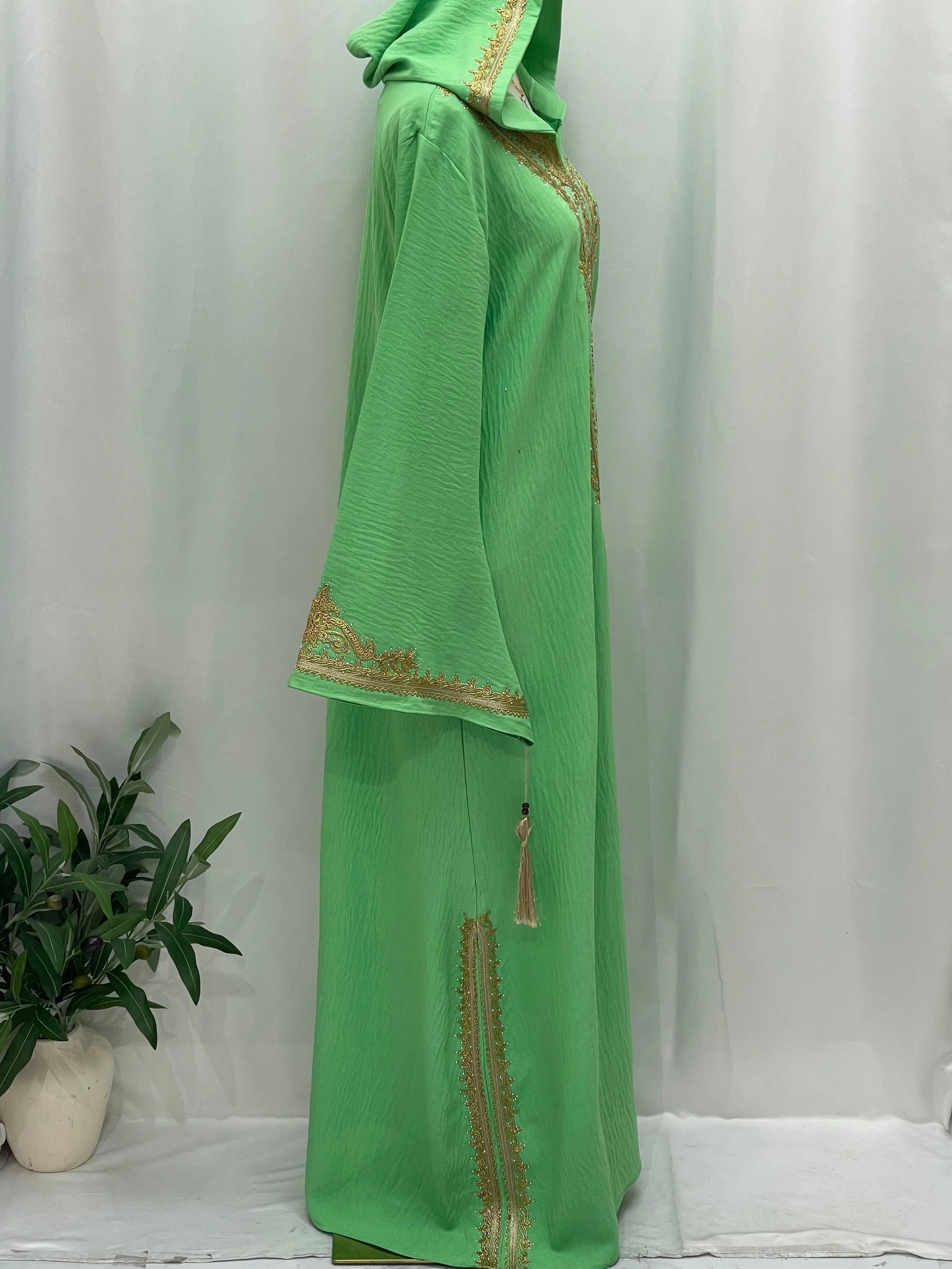 Palestinian Elegance green abaya with hood tassel and gold trim Moroccan Embroidered Djellaba