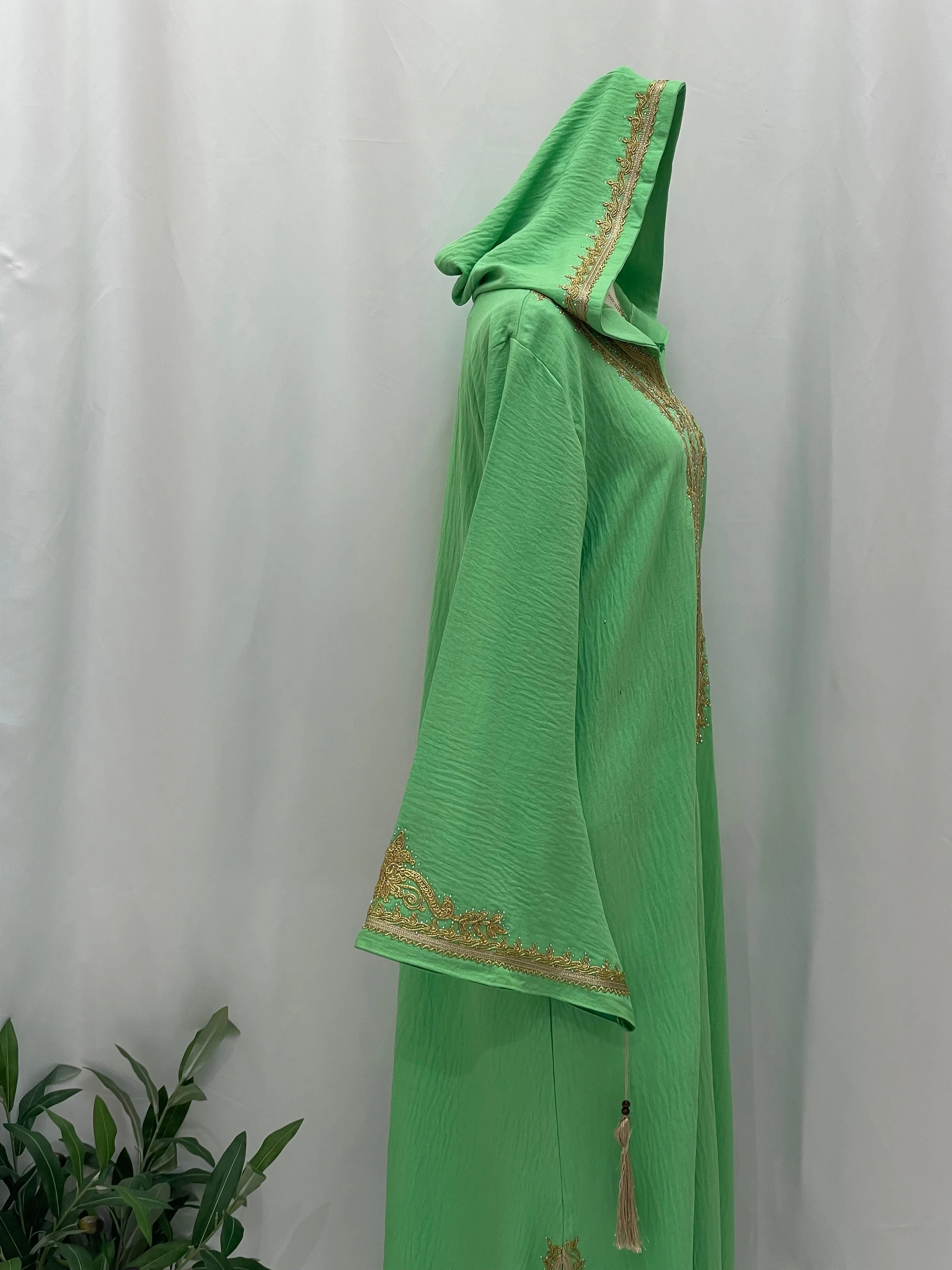 Palestinian Elegance green abaya with hood and gold trim detailing Moroccan Embroidered Djellaba for modest occasions