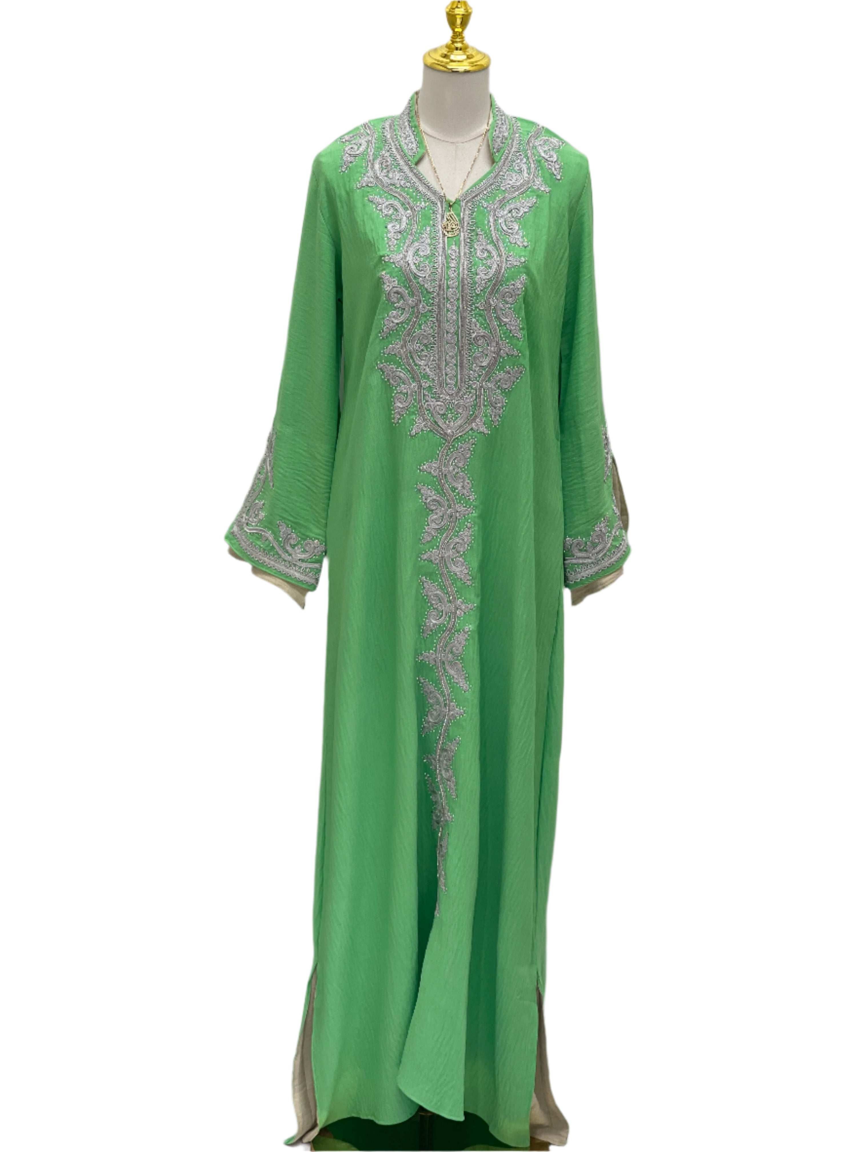 Green Palestinian Elegance Moroccan Rana Jalabia abaya with intricate silver embroidery on front and sleeves