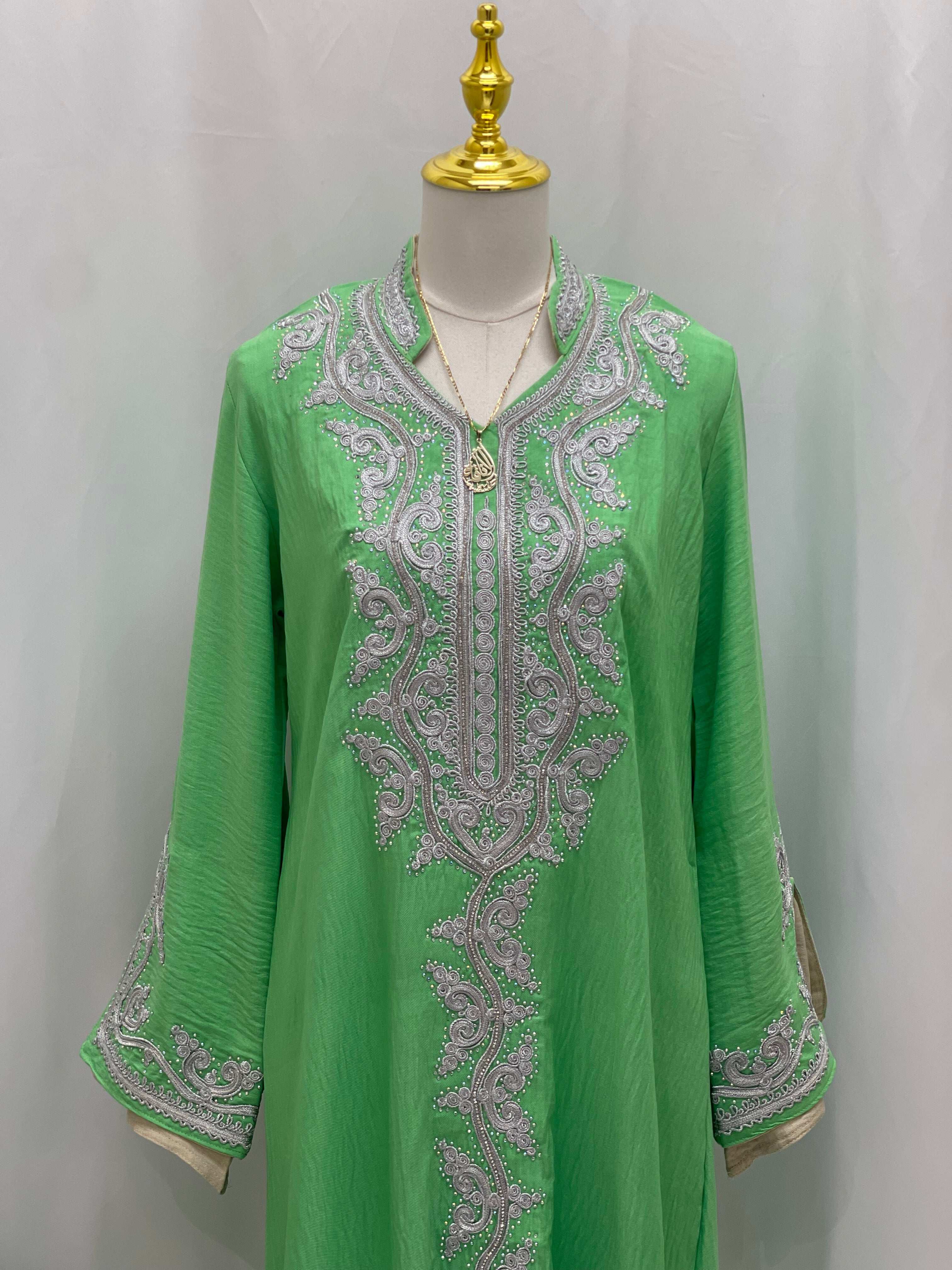 Palestinian Elegance green abaya with intricate silver embroidery Moroccan Rana Jalabia design on front and sleeves