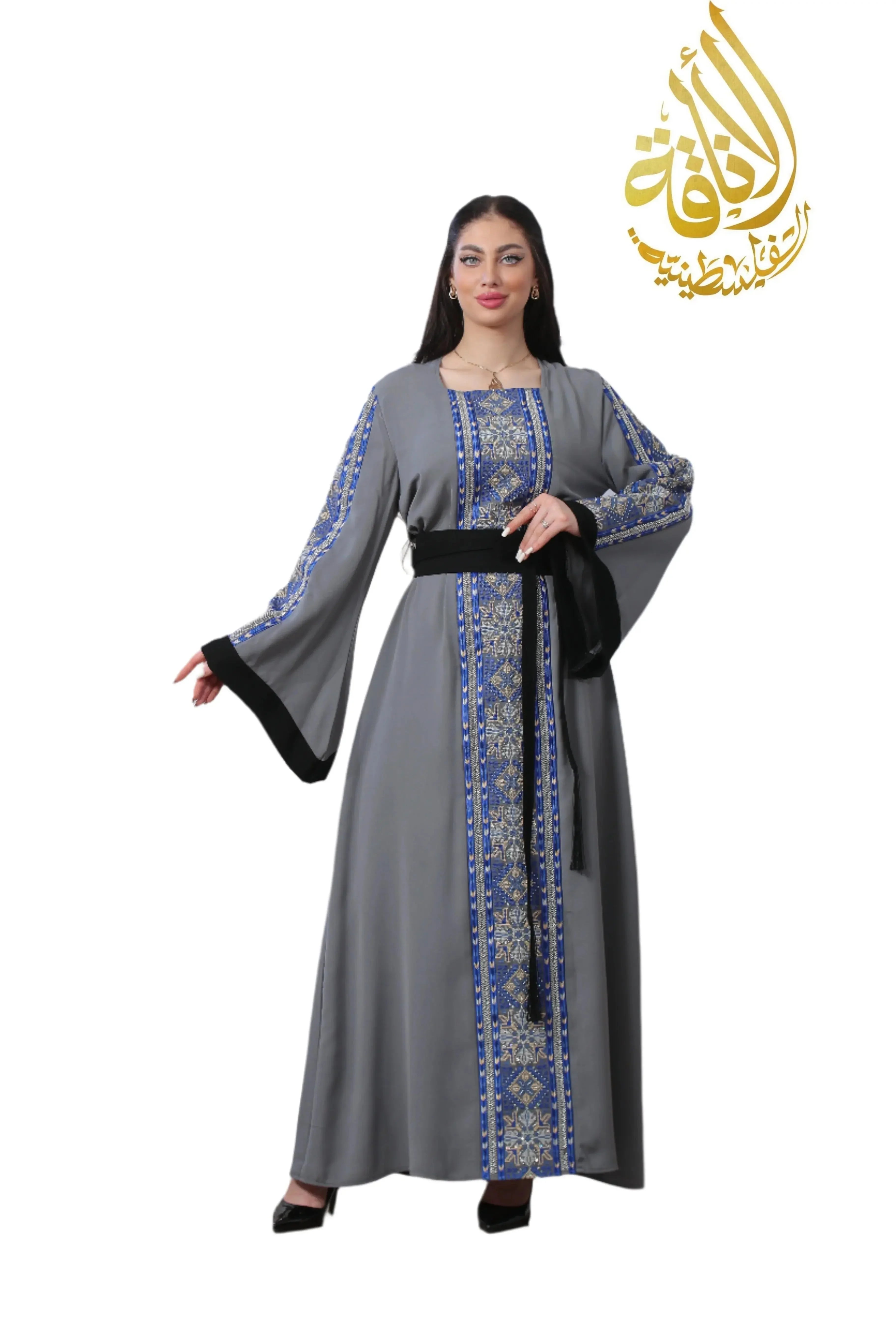 Palestinian Elegance Moroccan Rana Jalabia Thoub in gray with blue embroidery and black belt .