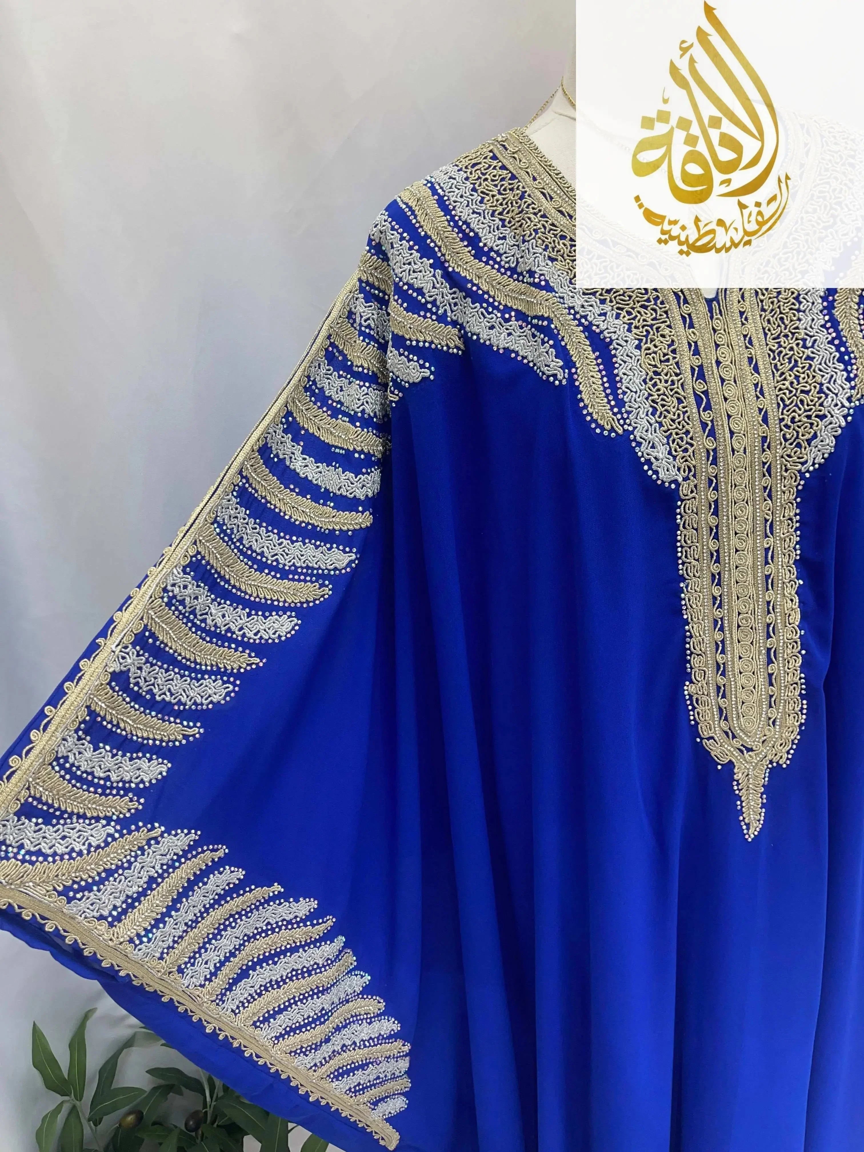 Palestinian Elegance Dana Free Size Kaftan Abaya in royal blue with intricate gold embroidery on neckline and sleeves