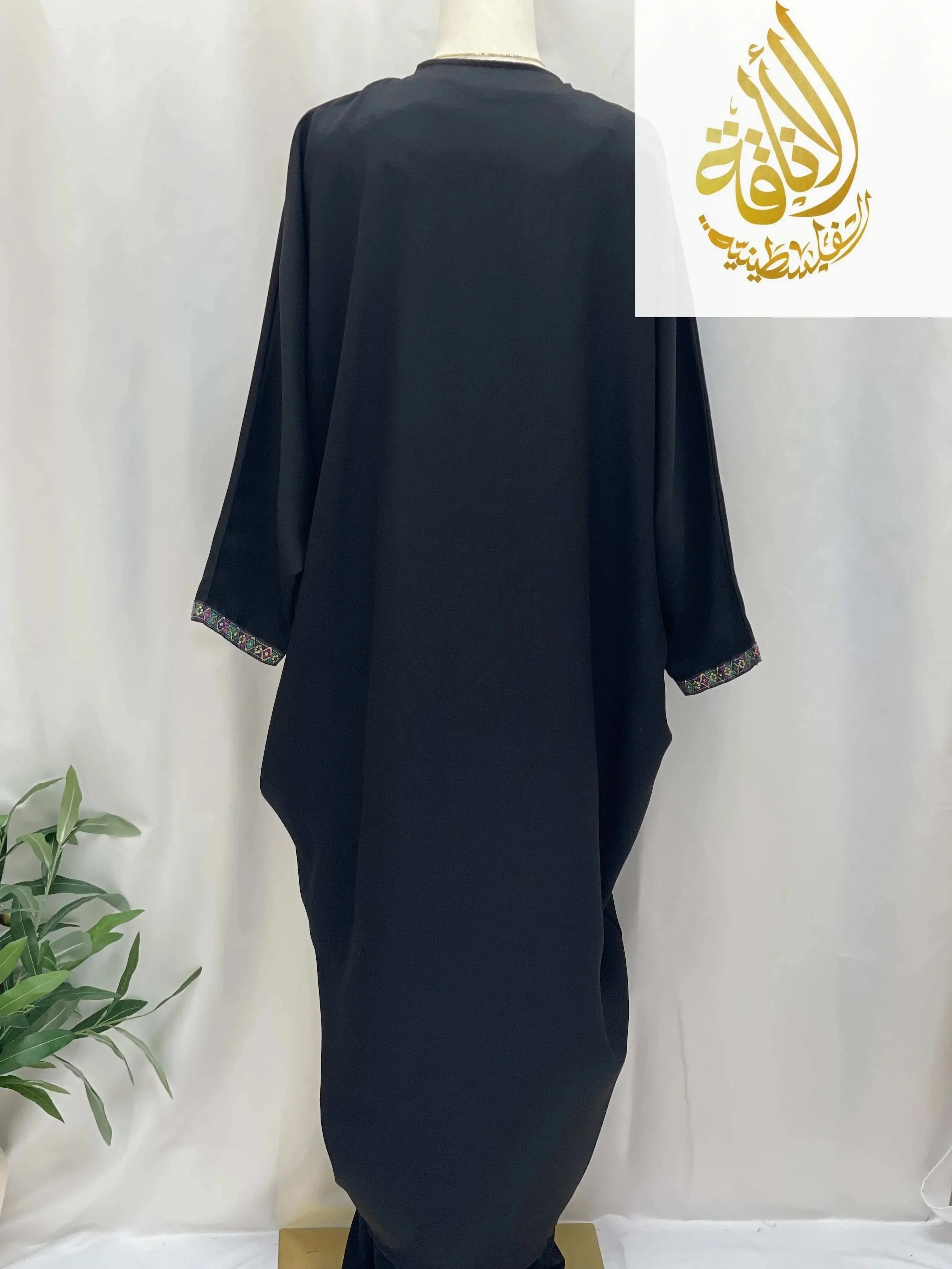 Black Dana Free Size Kimono cardigan by Palestinian Elegance with embroidered cuffs and loose fit