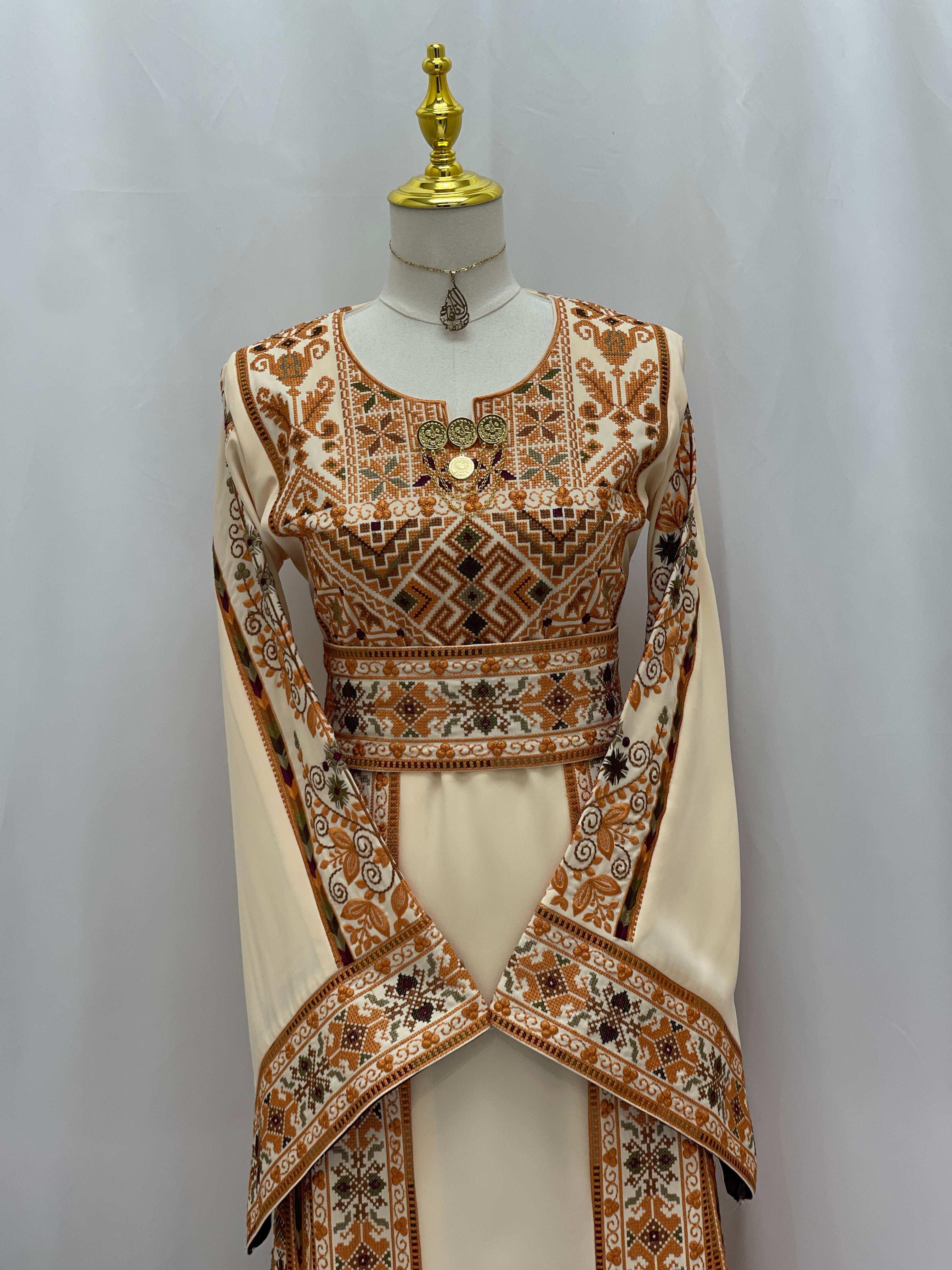Embroidered Palestine Traditional Beige Thobe with intricate brown embroidery and decorative accents on sleeves and chest