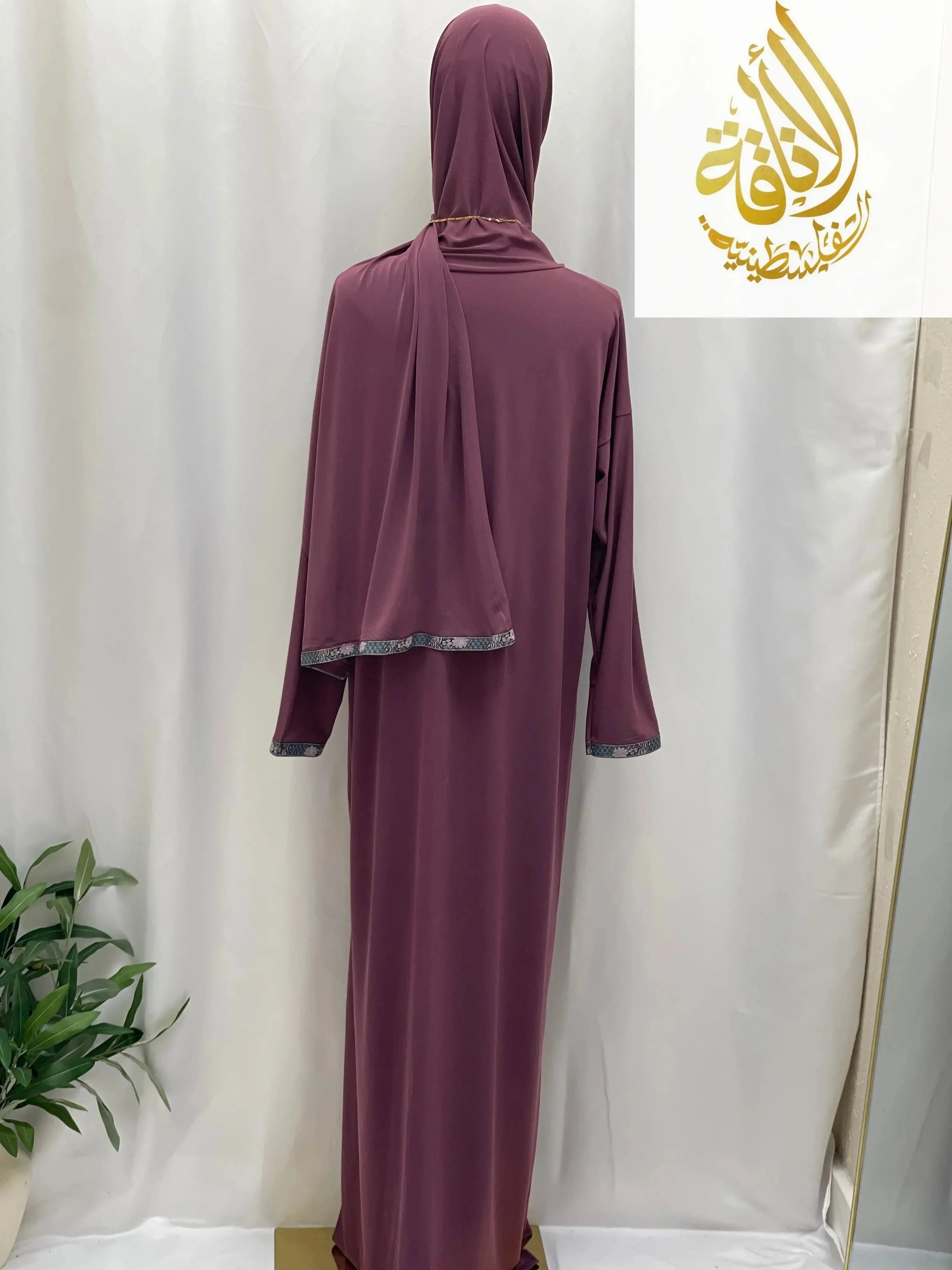 Palestinian Elegance maroon one piece prayer dress abaya with matching headscarf and silver trim details