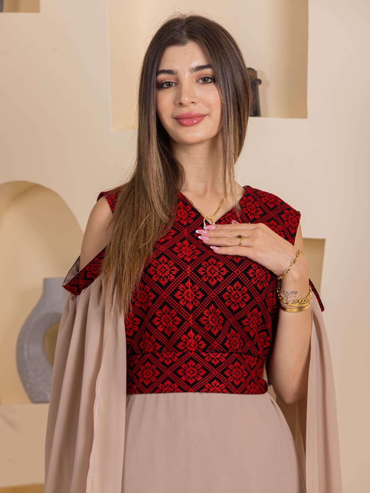 Palestinian Essence Dress beige gown with red black embroidered geometric bodice and draped cold shoulder sleeves