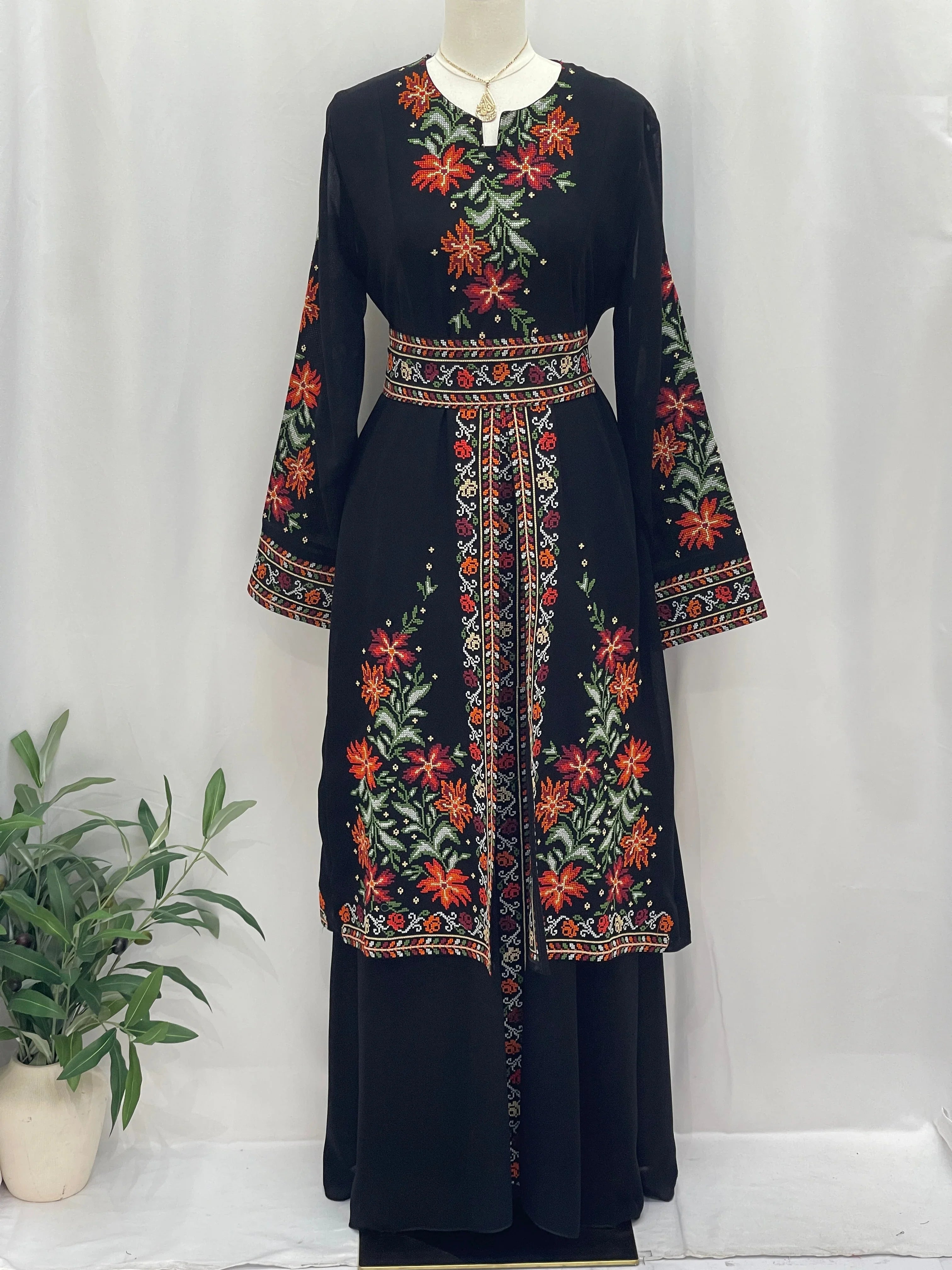 Elegant Rose Embroidered Dress Abaya featuring vibrant floral designs and flowing silhouette