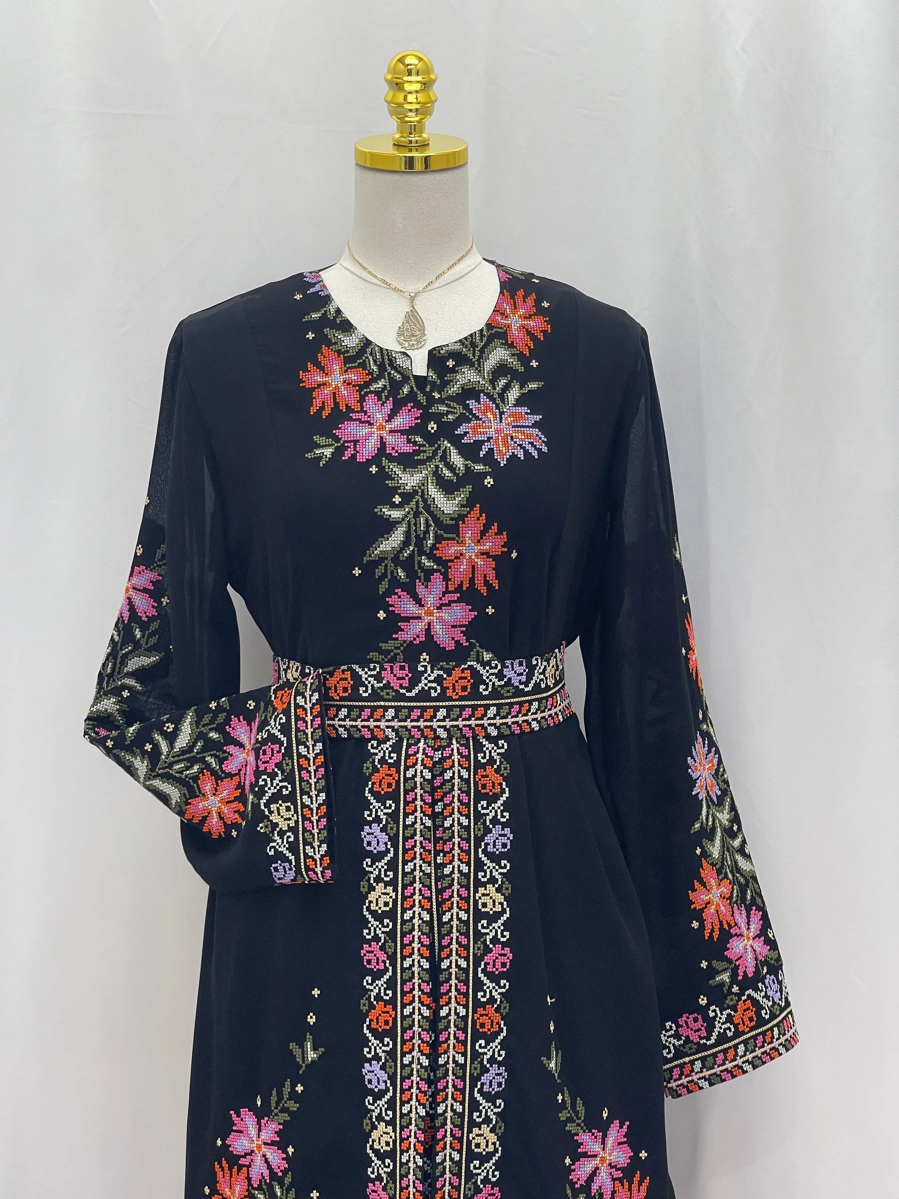 Elegant Rose Embroidered Dress Abaya featuring colorful floral designs and a traditional fit
